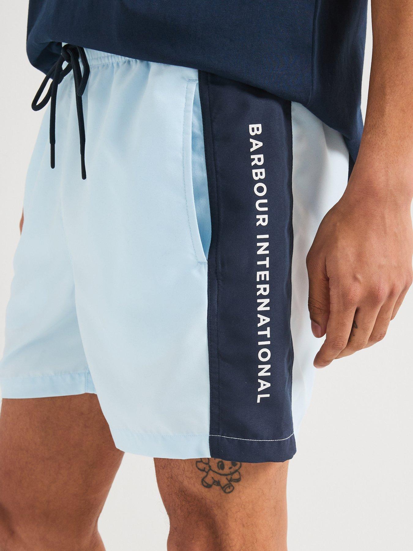  image of barbour-international-panel-logo-swimwear-shorts--light-blue