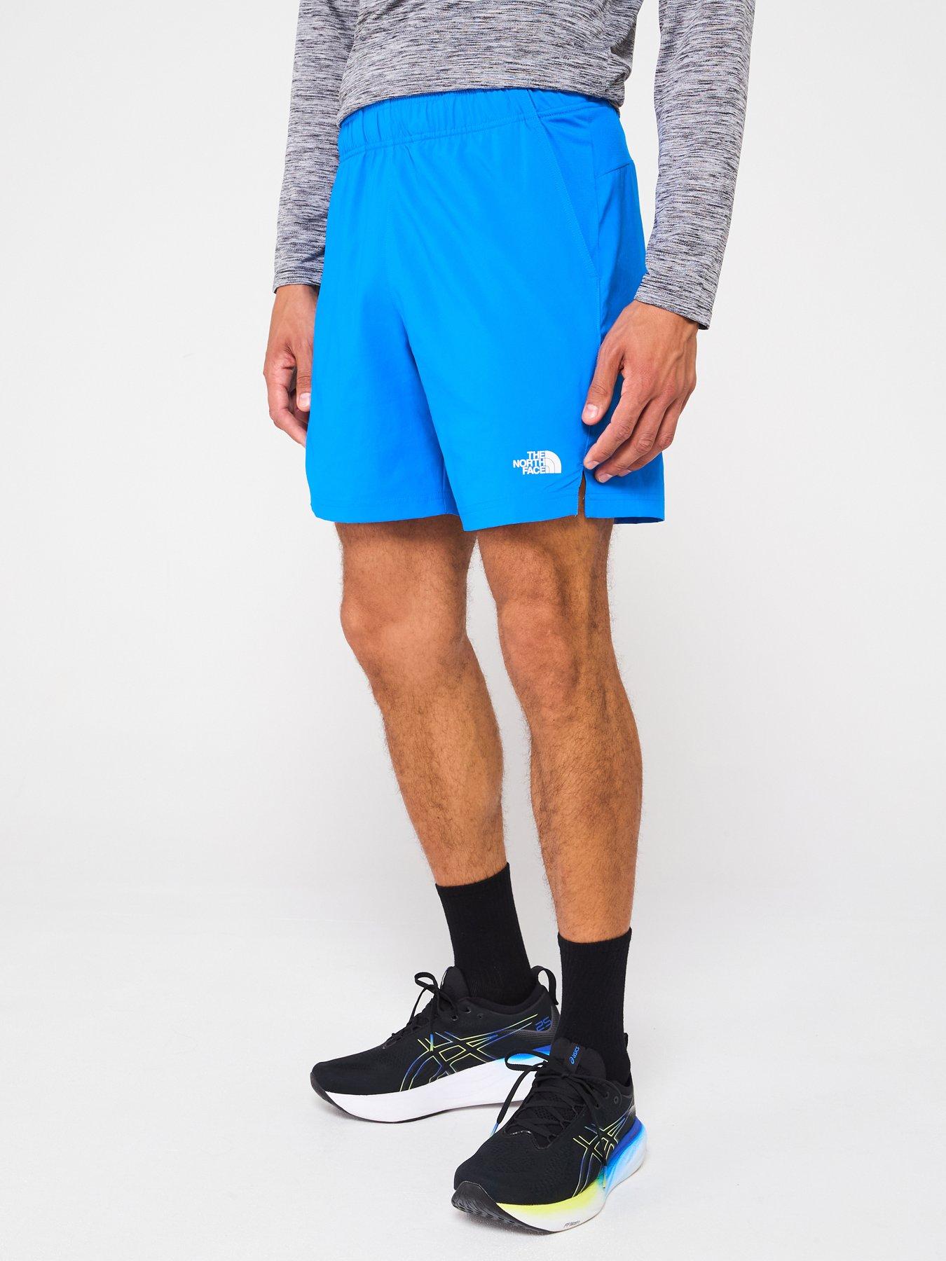 the-north-face-mens-247-7-inch-shorts-blue