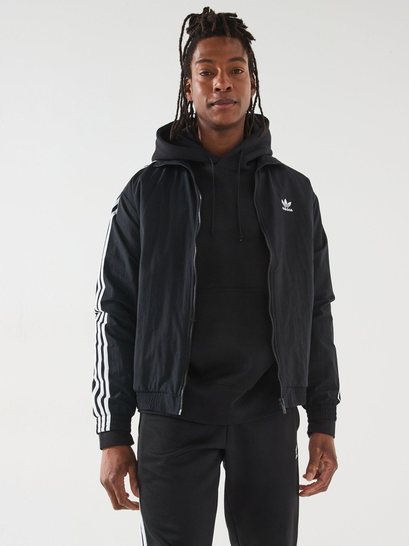  image of adidas-originals-mens-woven-firebird-track-top-black