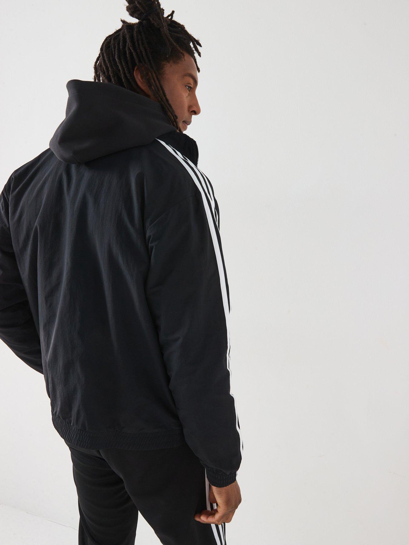  image of adidas-originals-mens-woven-firebird-track-top-black