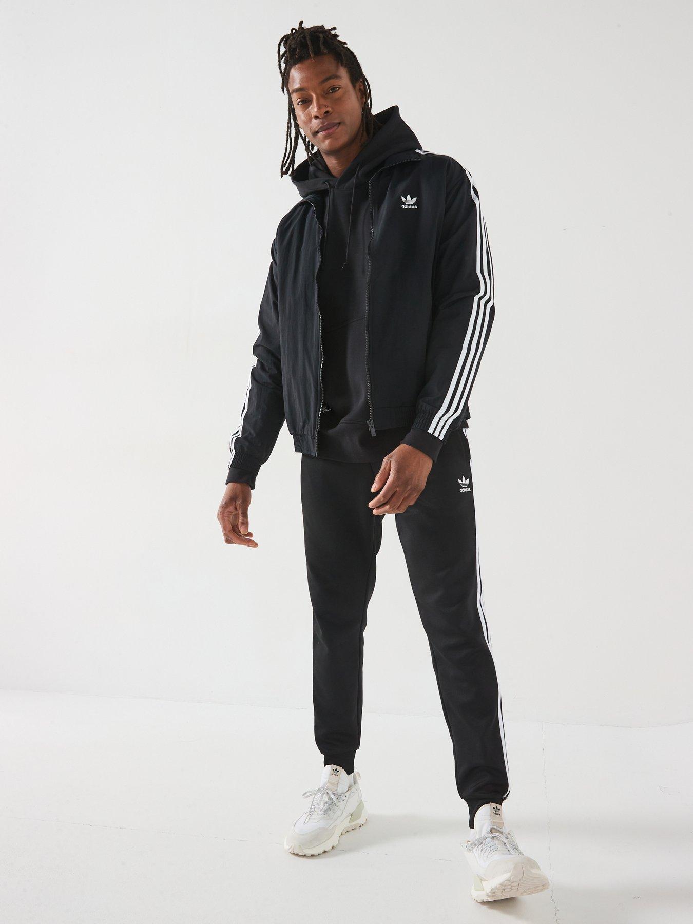  image of adidas-originals-mens-woven-firebird-track-top-black