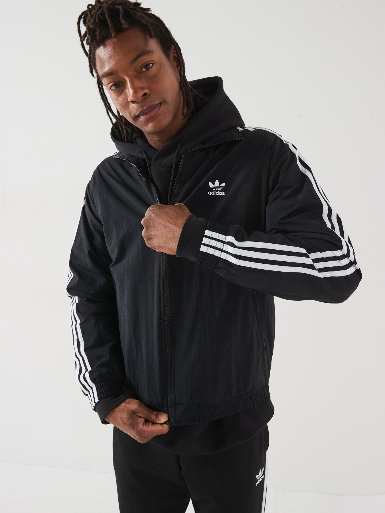  image of adidas-originals-mens-woven-firebird-track-top-black