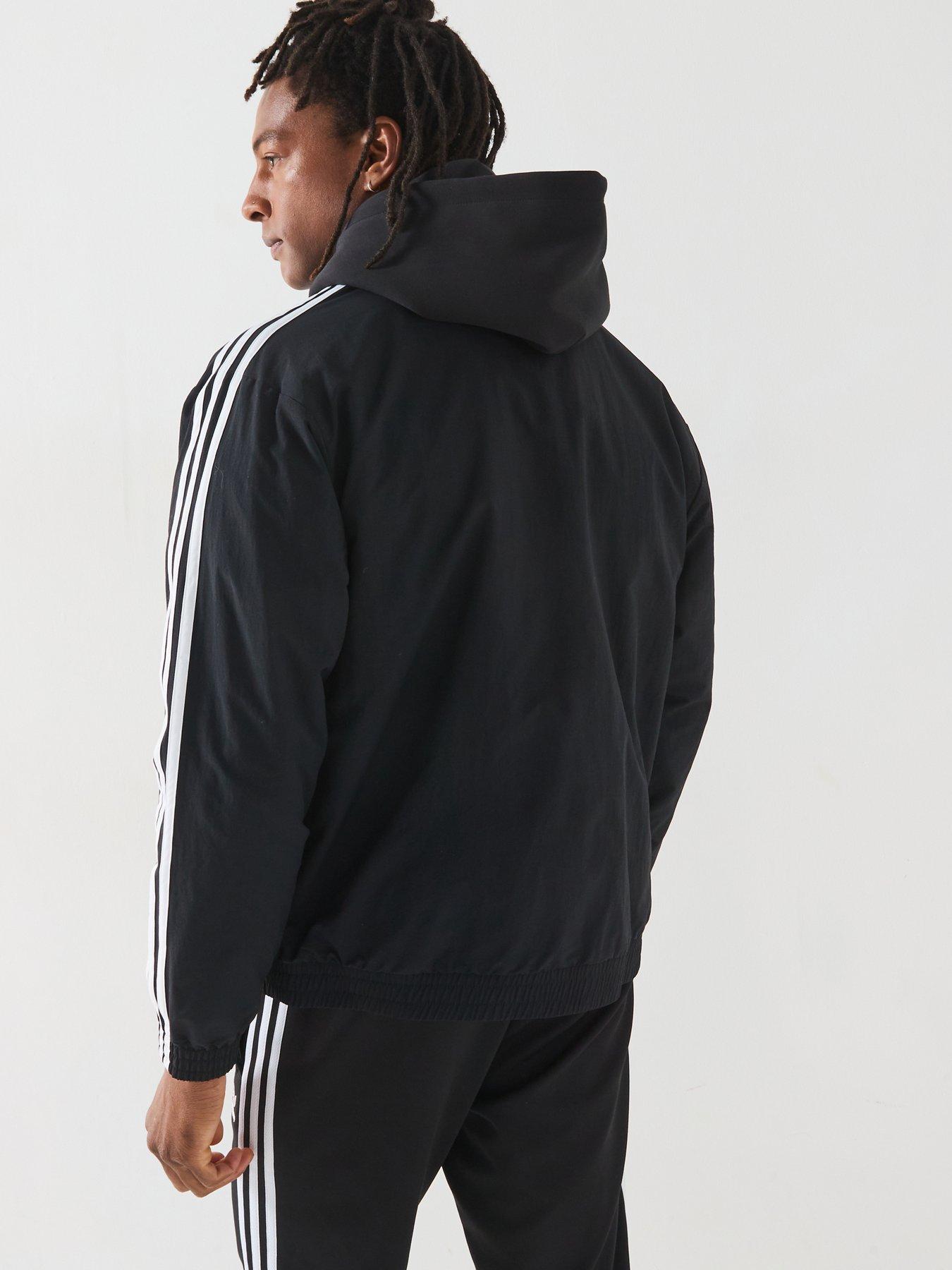  image of adidas-originals-mens-woven-firebird-track-top-black