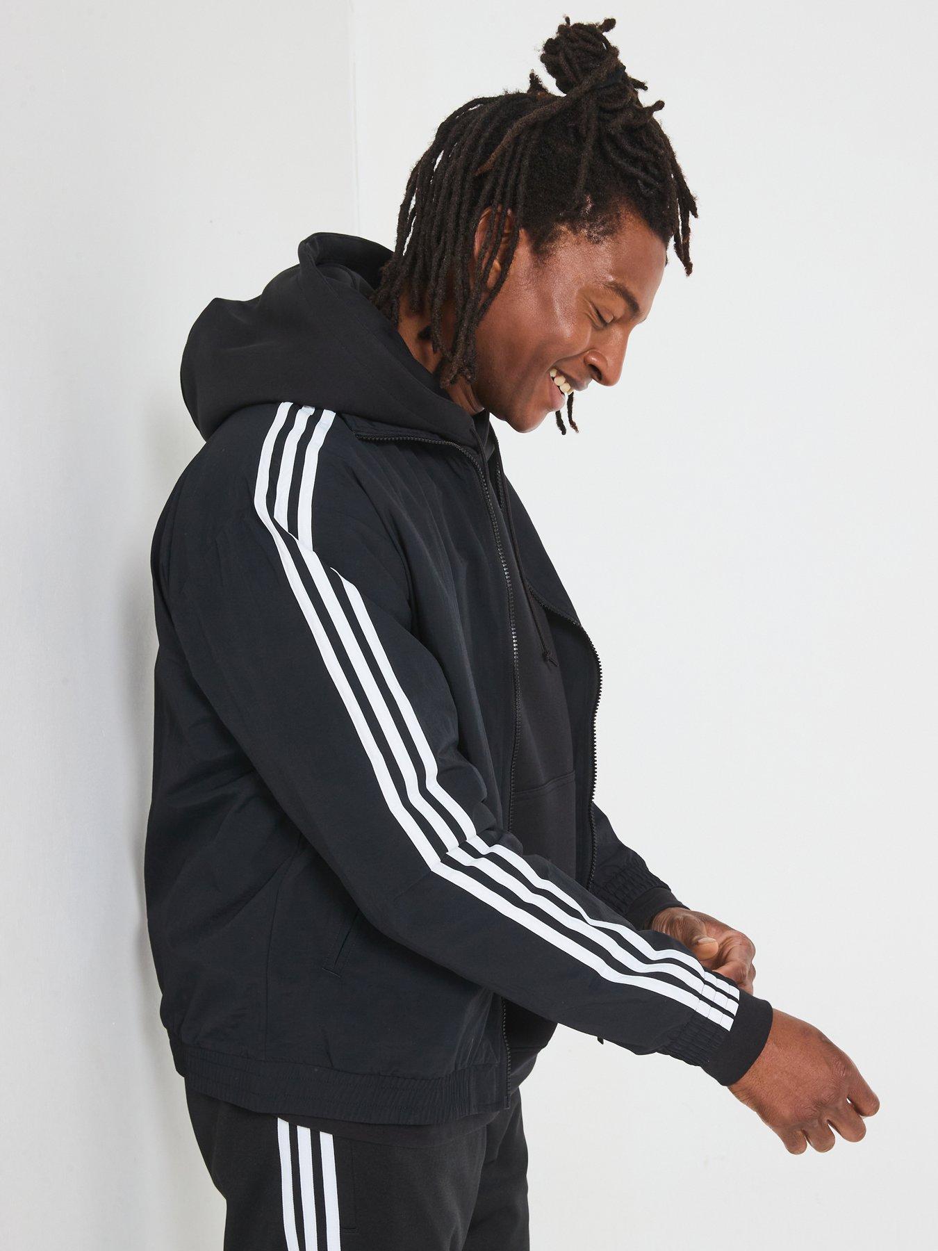  image of adidas-originals-mens-woven-firebird-track-top-black
