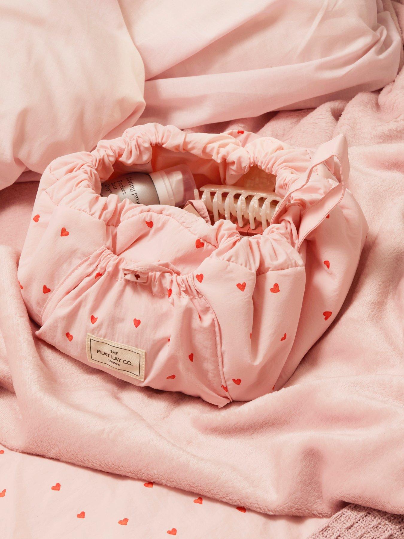  image of the-flat-lay-co-marshmallow-drawstring-makeup-bag-in-pink-hearts