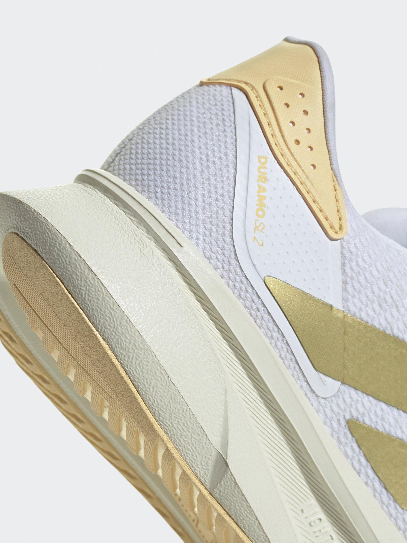  image of adidas-womens-running-duramo-sl2-trainers-whitegold-metorange-tint