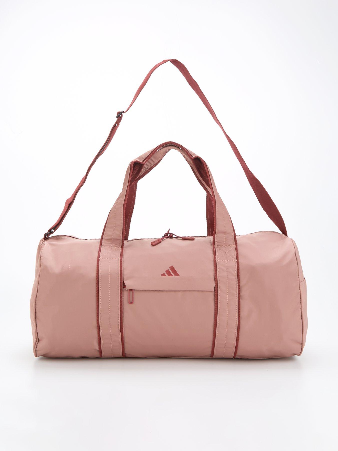  image of adidas-womens-yoga-duffel-bag-pink