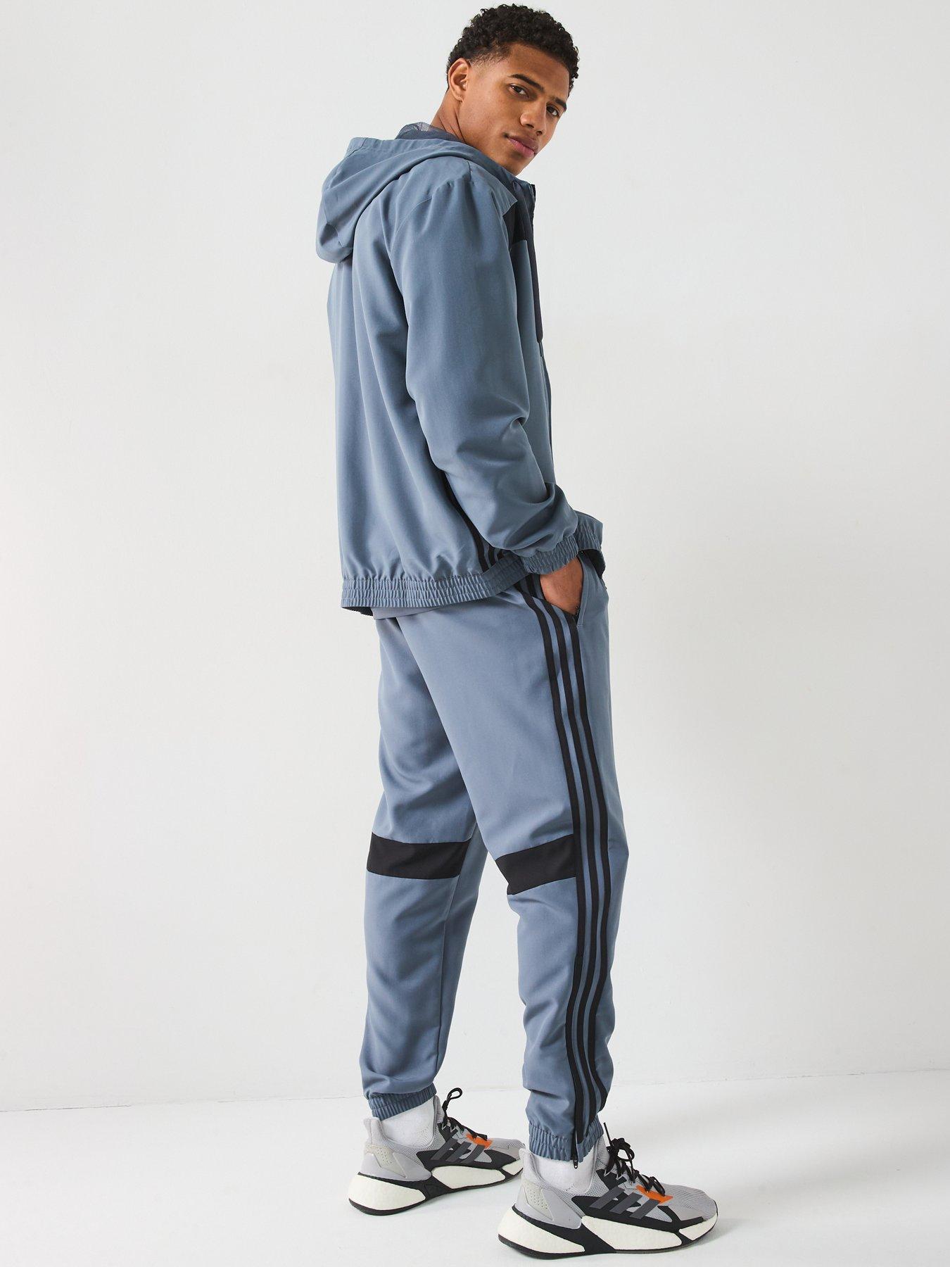  image of adidas-mens-tiro-essentials-woven-hoody-greyorange