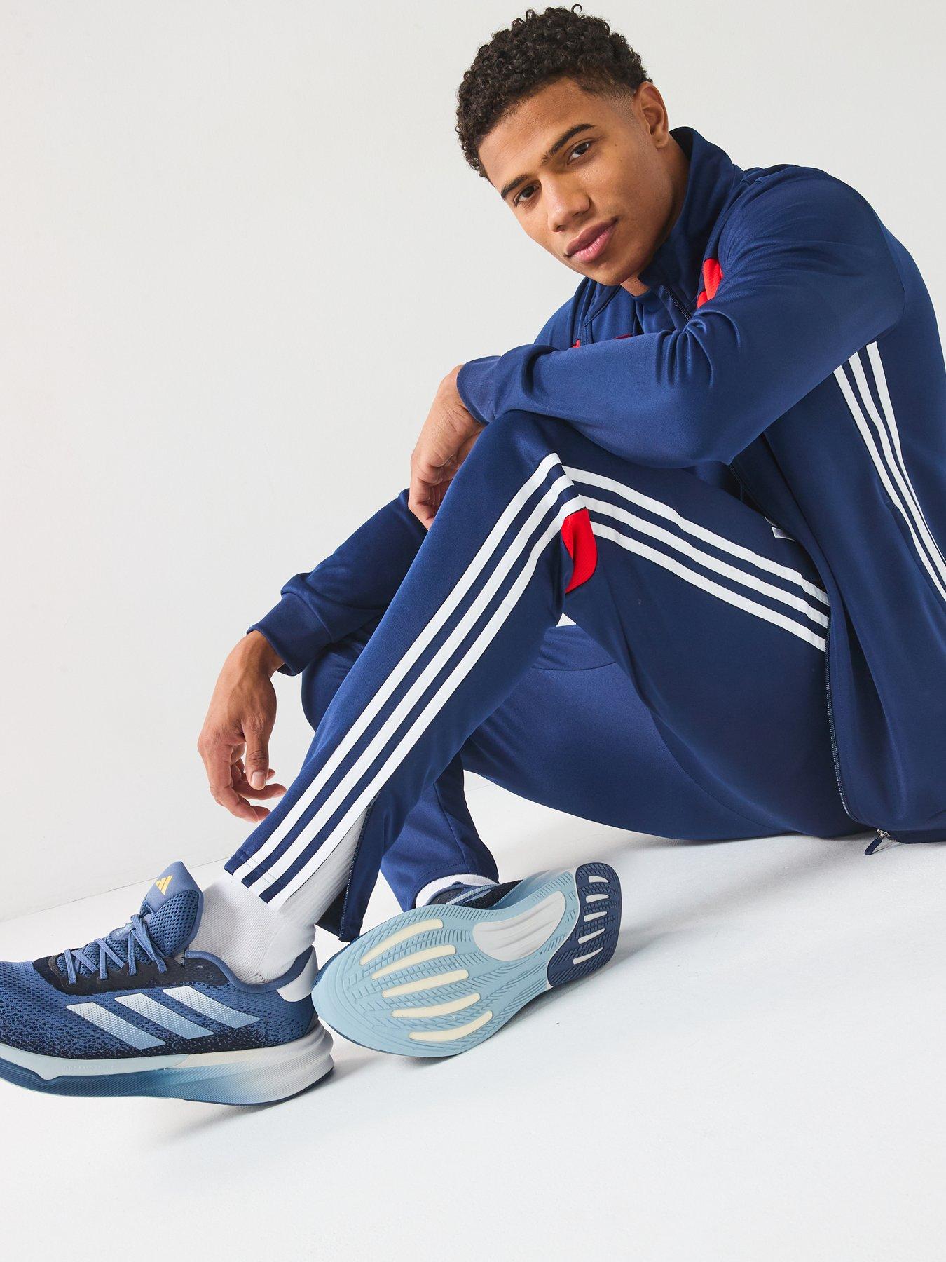  image of adidas-mens-tiro-essentials-tracksuit-bluered
