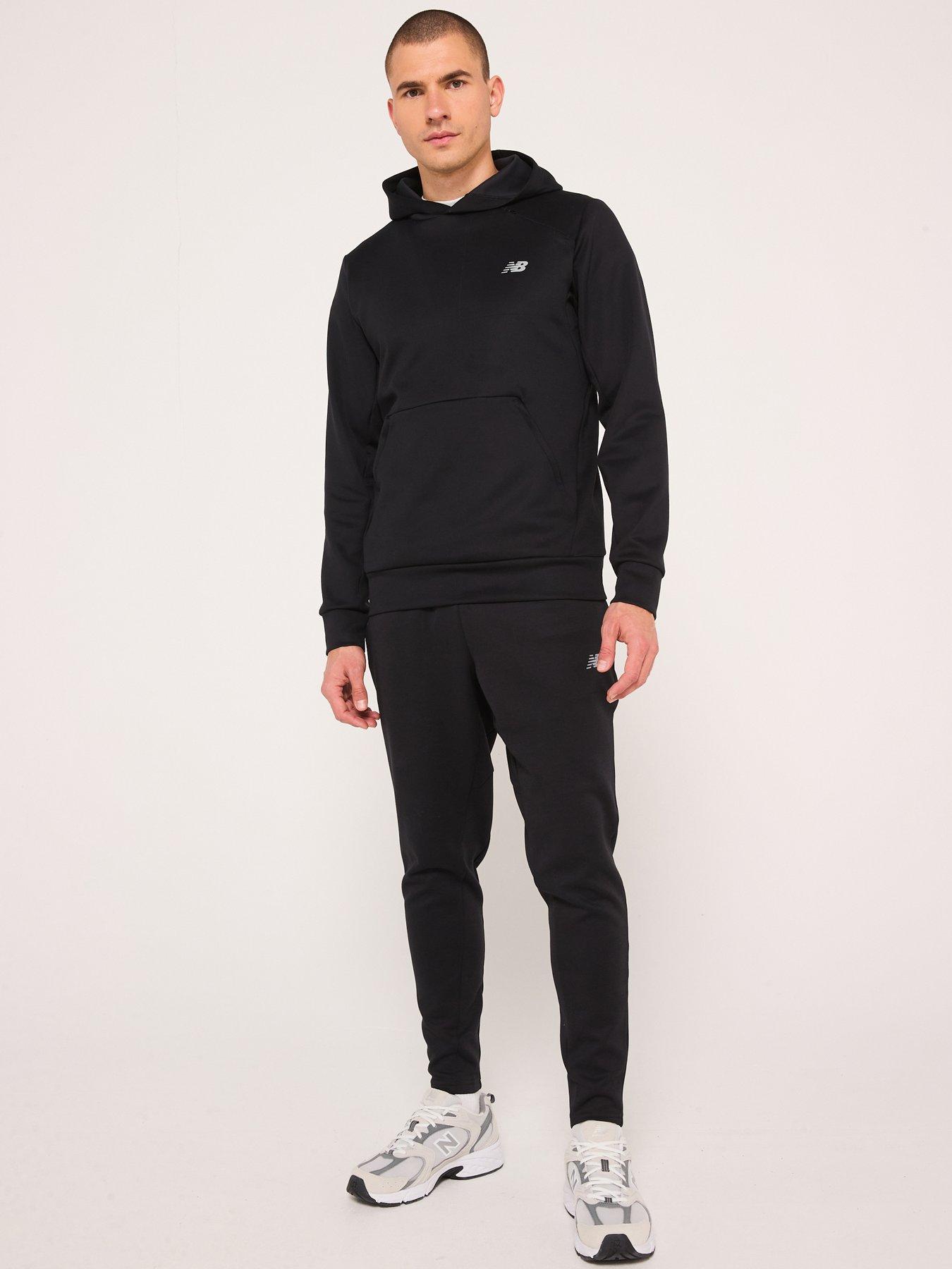  image of new-balance-mens-running-tech-knit-pants-black