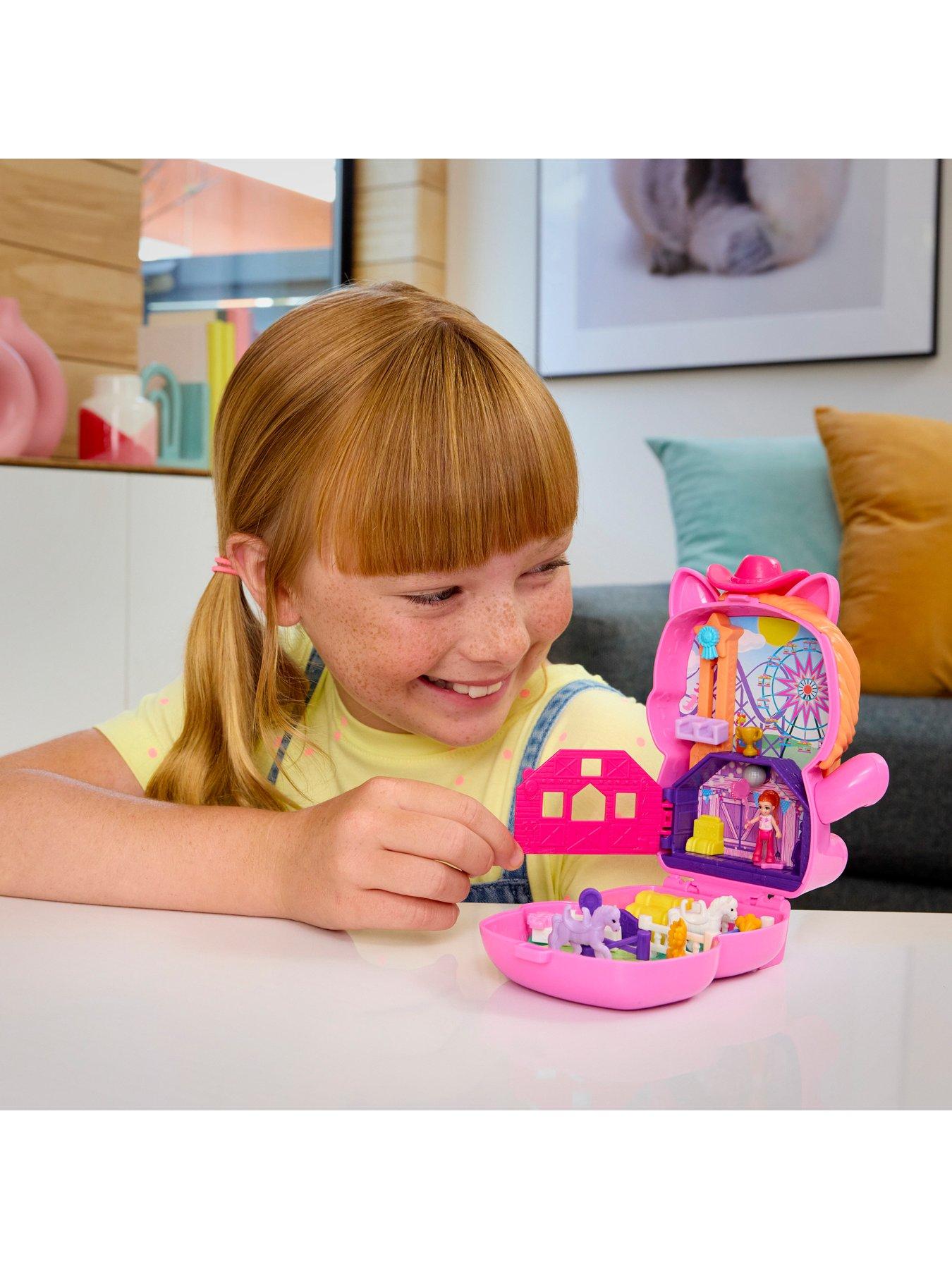  image of polly-pocket-pony-rodeo-compact-playset-with-1-micro-doll-and-pet-horses-travel-toy-with-food-amp-styling-accessories
