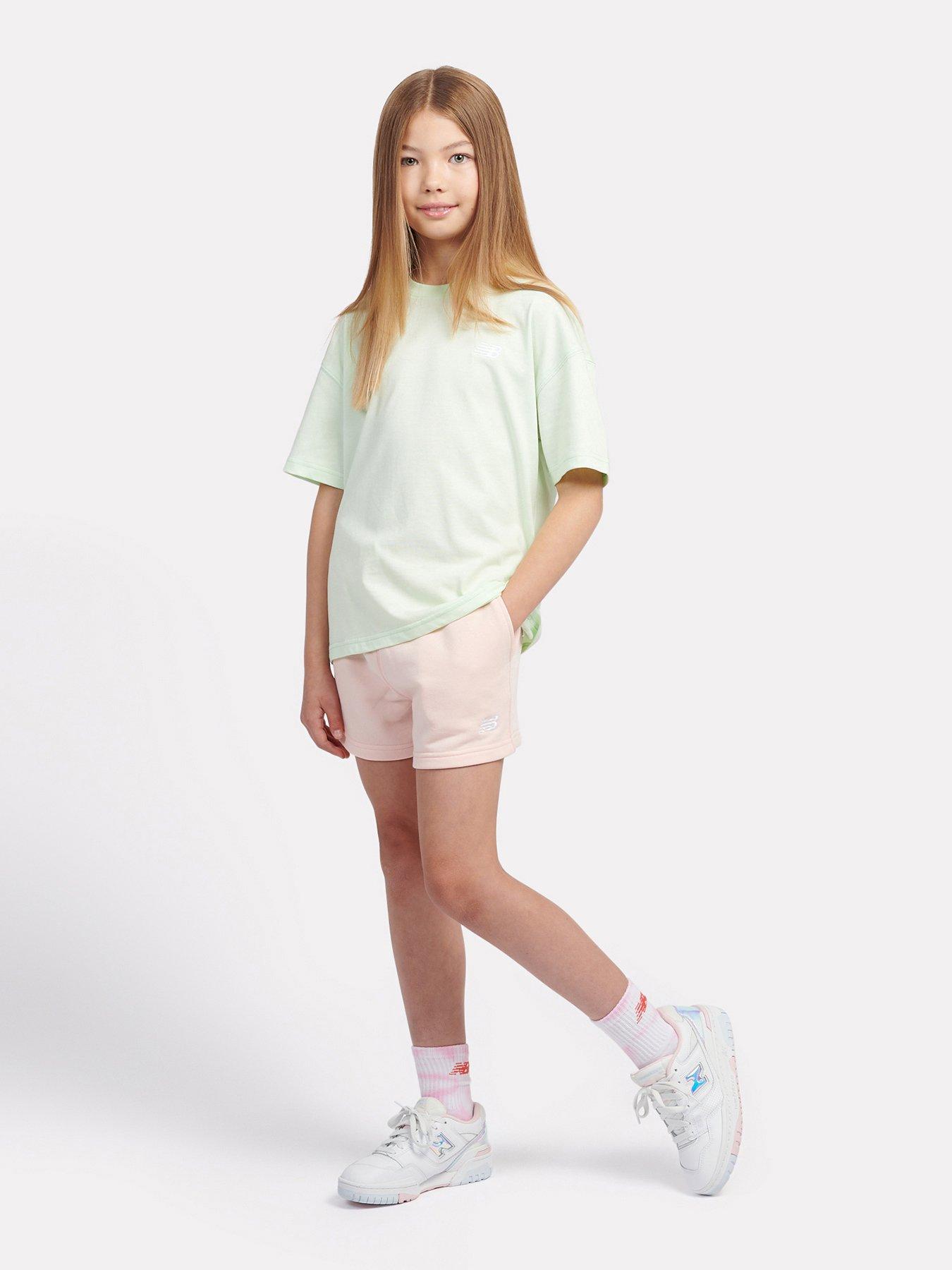  image of new-balance-junior-girls-french-terry-small-logo-short-light-pink