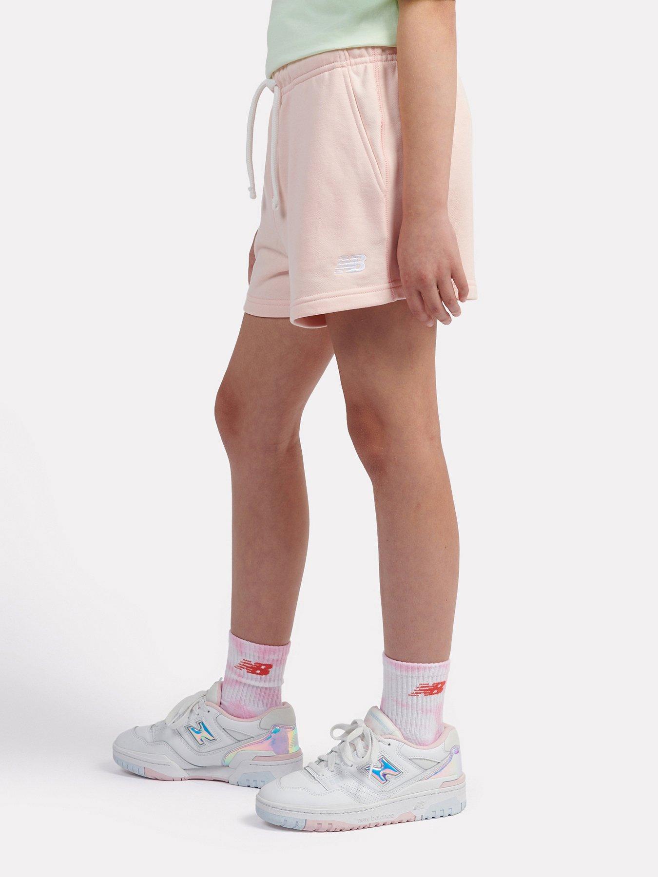  image of new-balance-junior-girls-french-terry-small-logo-short-light-pink