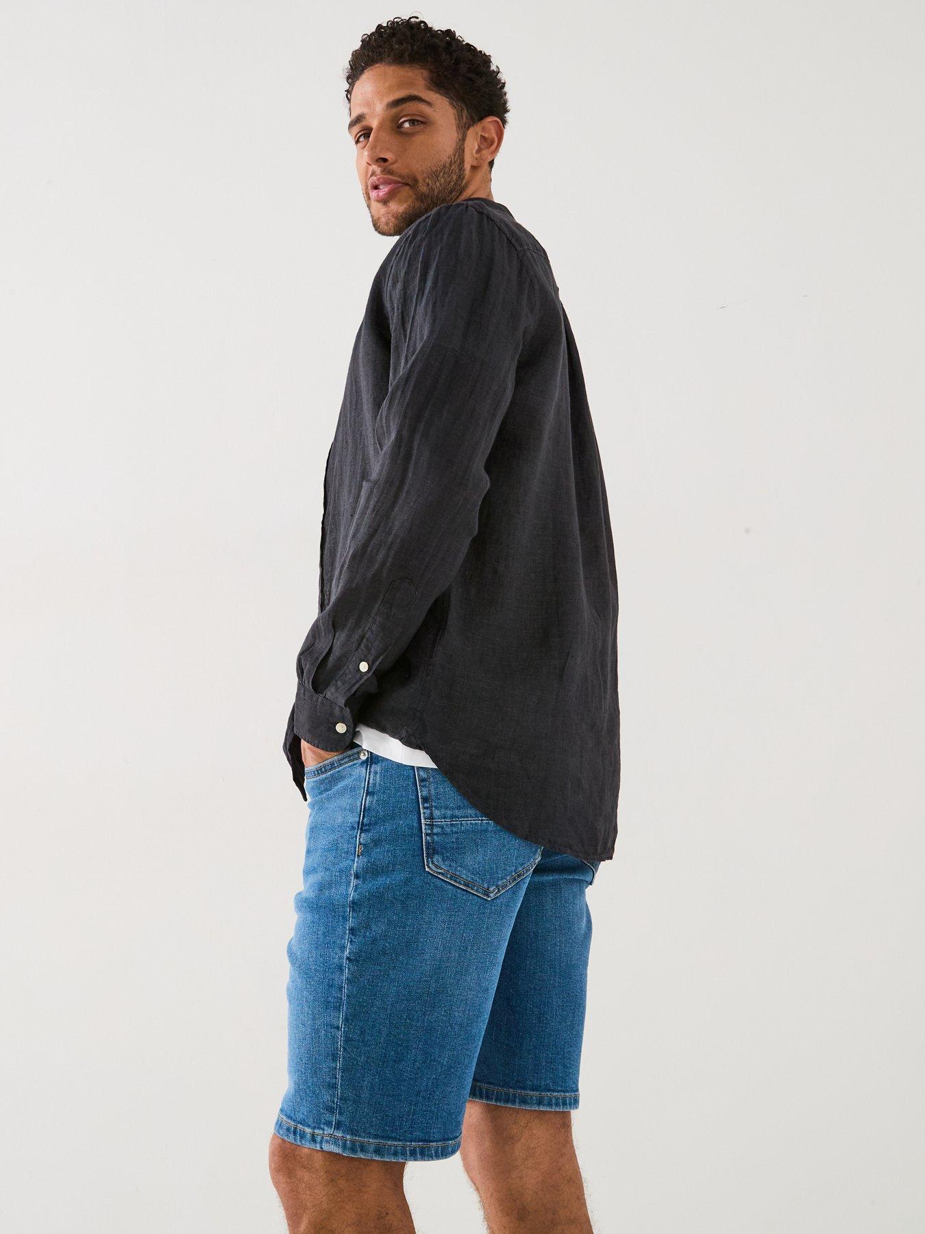  image of tommy-hilfiger-regular-fit-pigment-dyed-long-sleeve-shirt-black