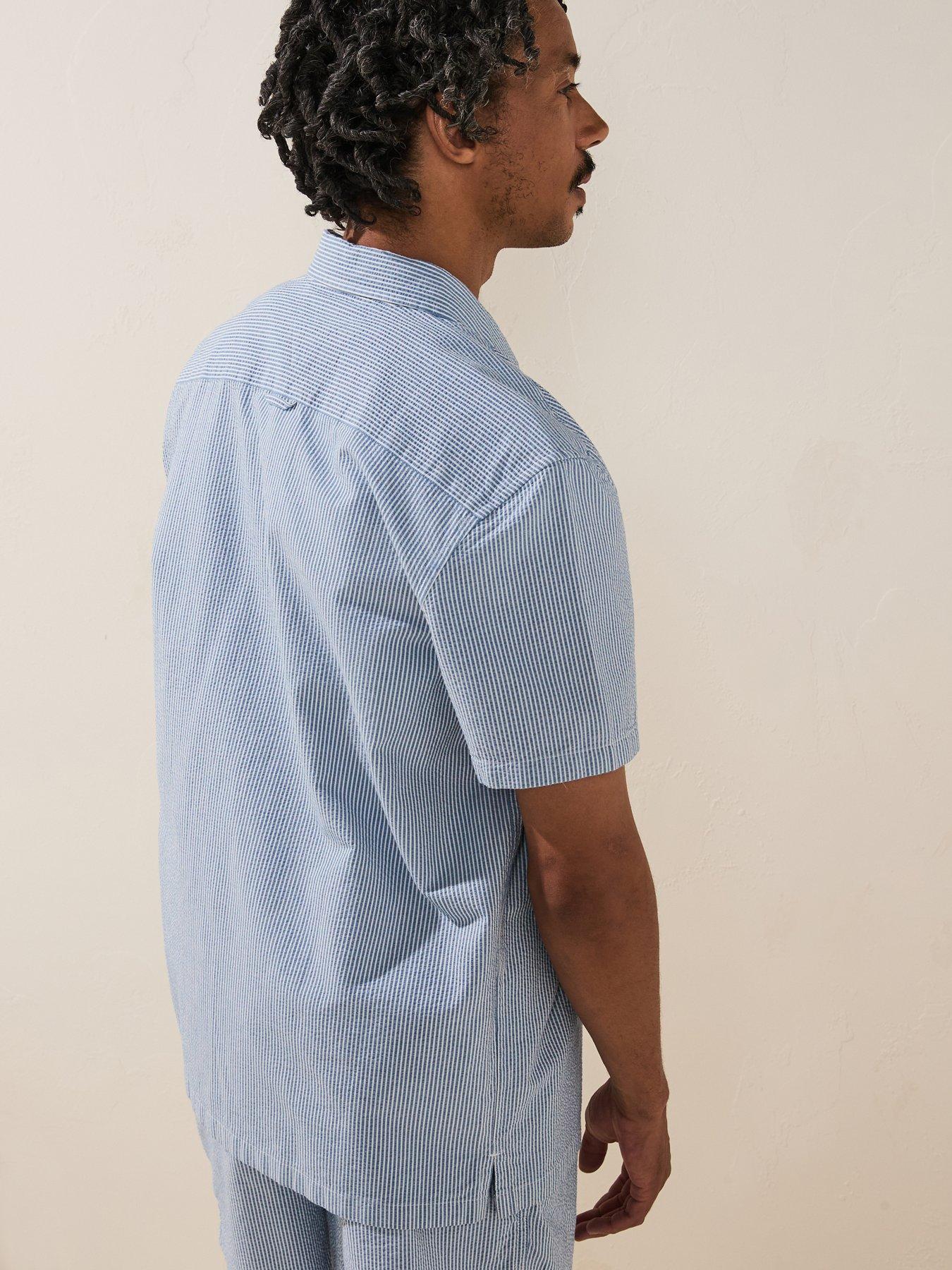  image of tommy-jeans-regular-stripe-seersucker-short-sleeve-shirt-light-blue