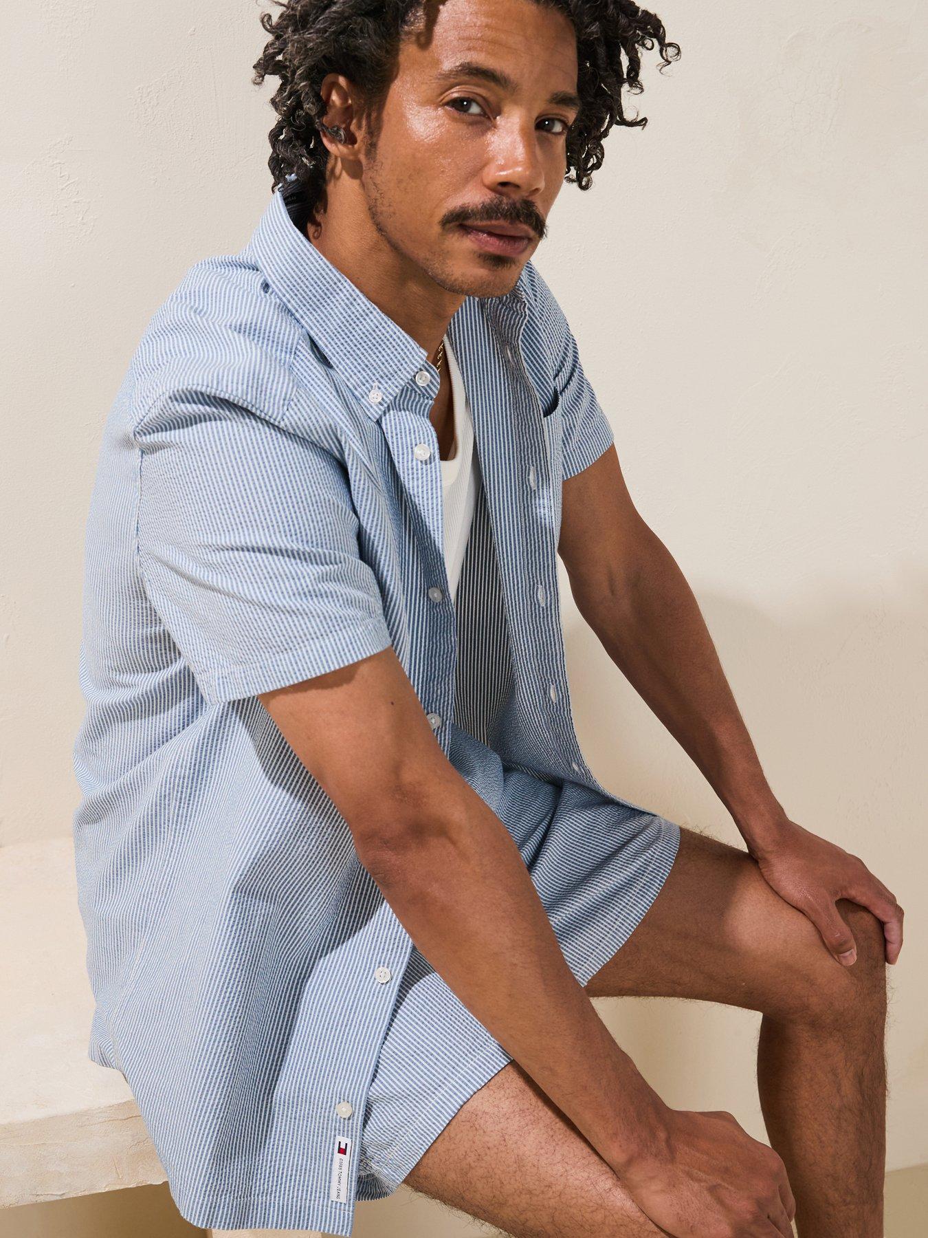  image of tommy-jeans-regular-stripe-seersucker-short-sleeve-shirt-light-blue