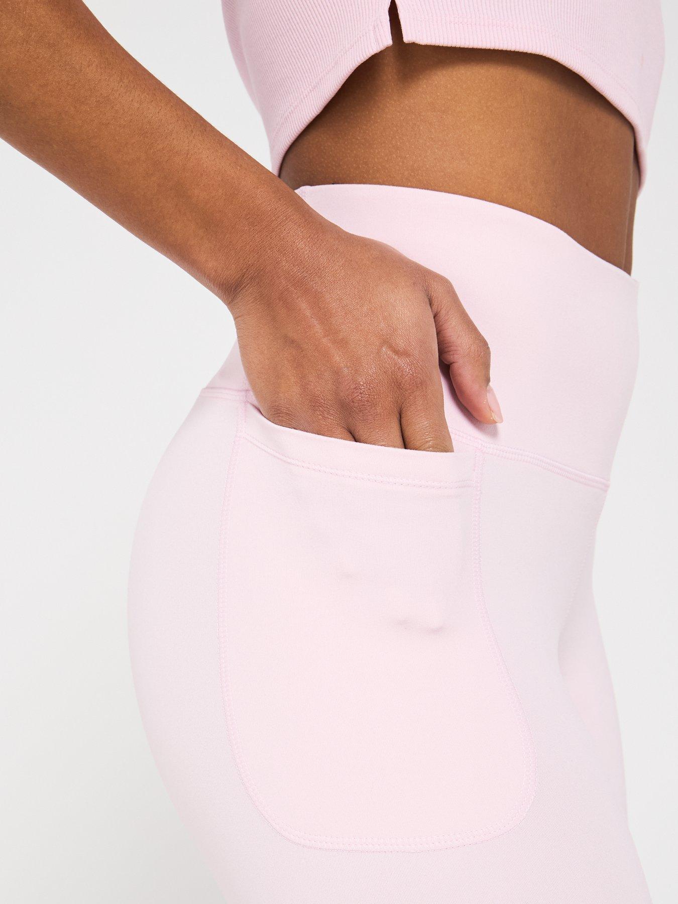  image of under-armour-womens-training-motion-leggings-pink