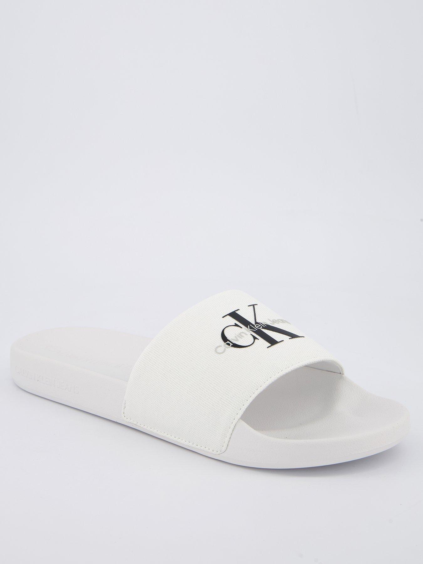 calvin-klein-logo-slides-white