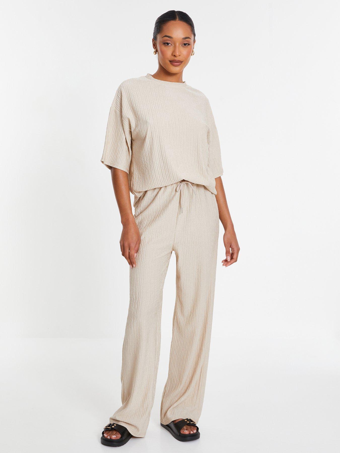 Image 1 of 6 of Quiz Stone Textured Palazzo Trousers