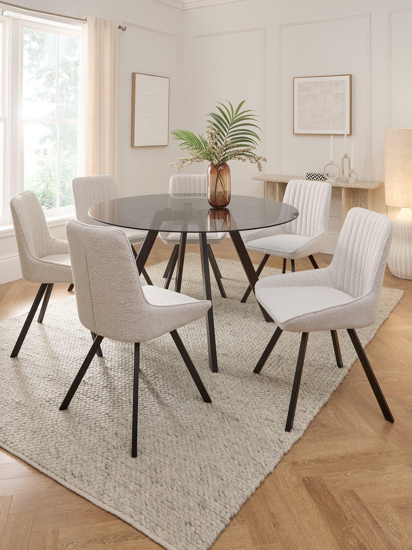 front image of very-home-marlow-130-cm-black-round-dining-table-nbsp6-marlow-boucle-chairs