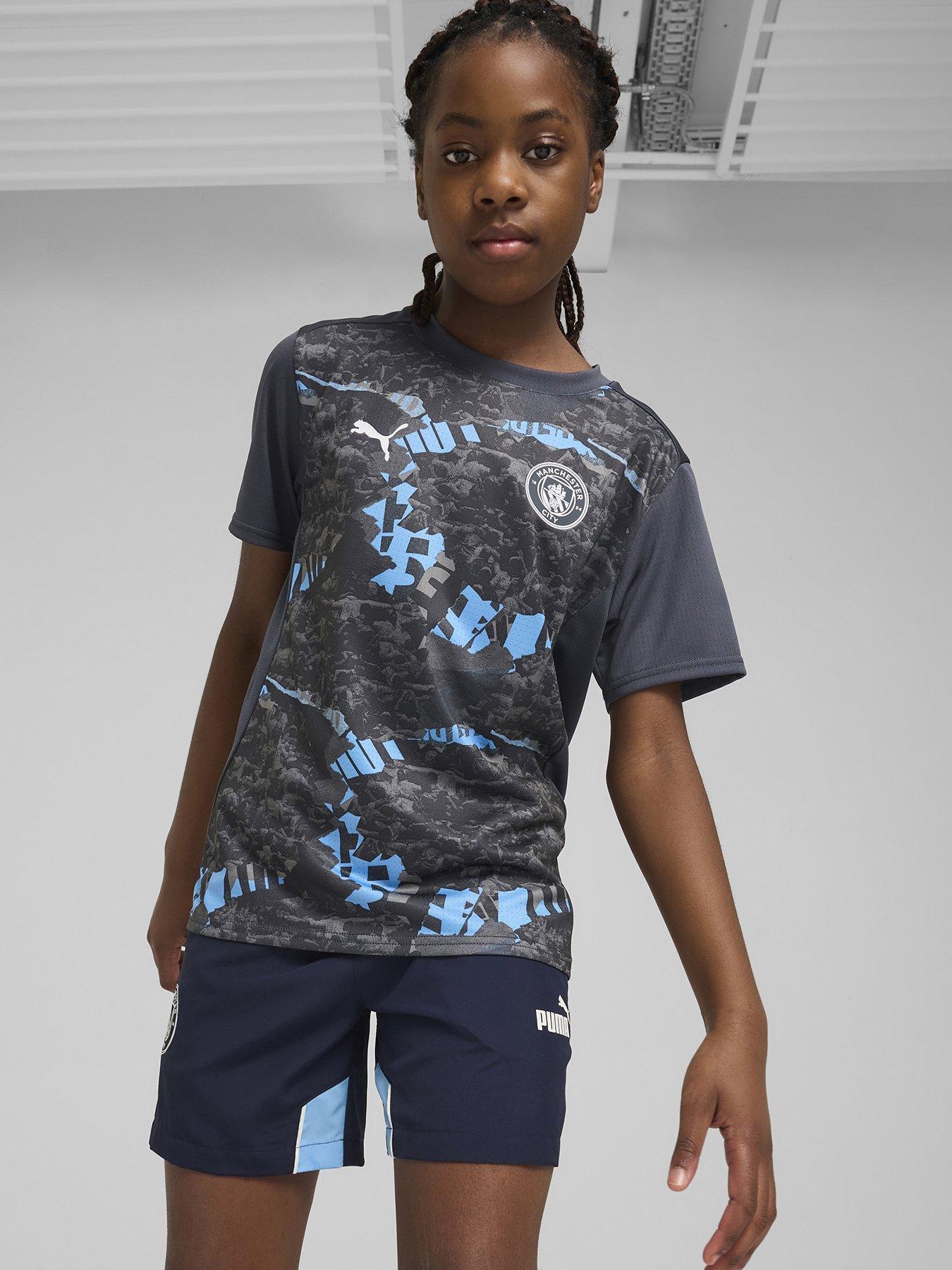 puma-junior-mcfc-prematch-short-sleeve-jersey-grey