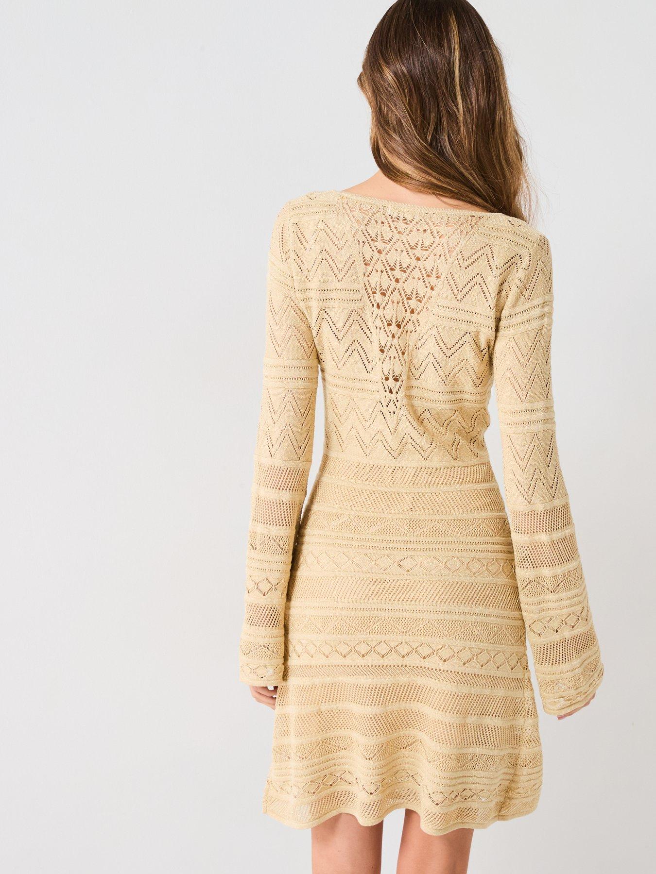 Image 2 of 6 of Guess Nellie Long Sleeve V Neck Knitted Dress &nbsp;- Gold