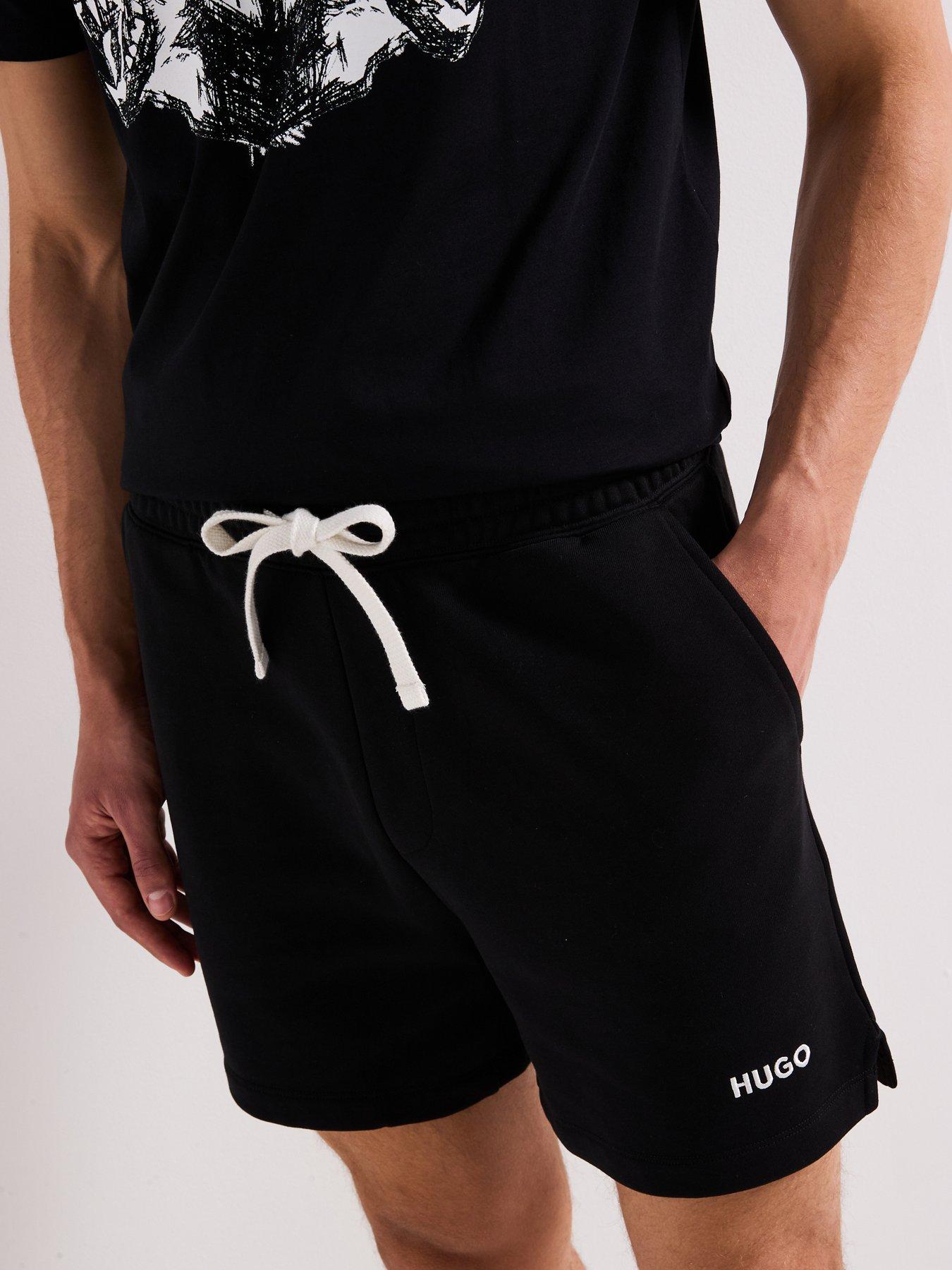  image of hugo-dulasho-relaxed-contrast-logo-jersey-shorts-black