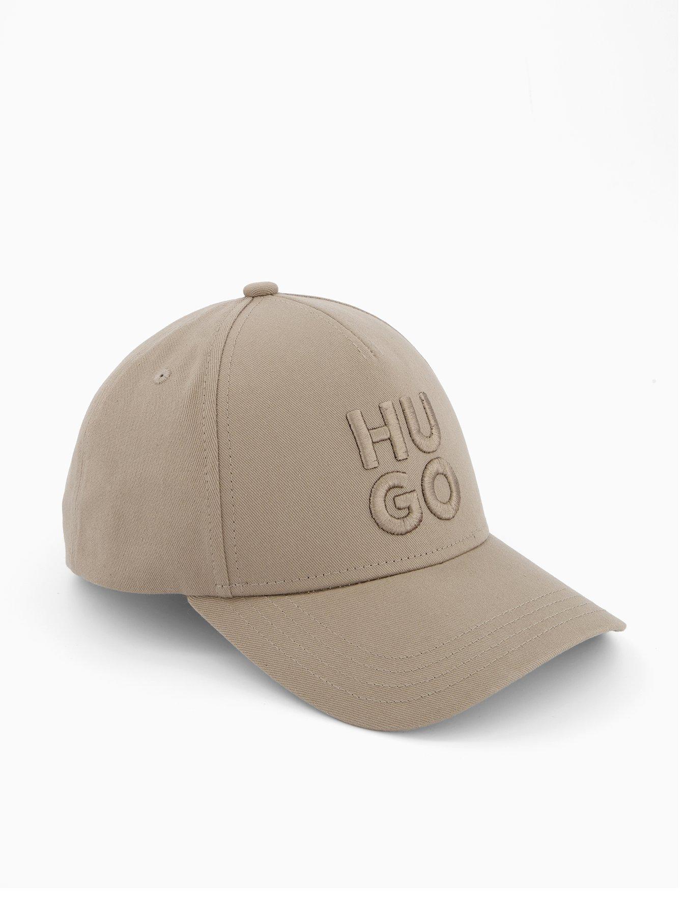  image of hugo-jude-stacked-logo-cap-brown