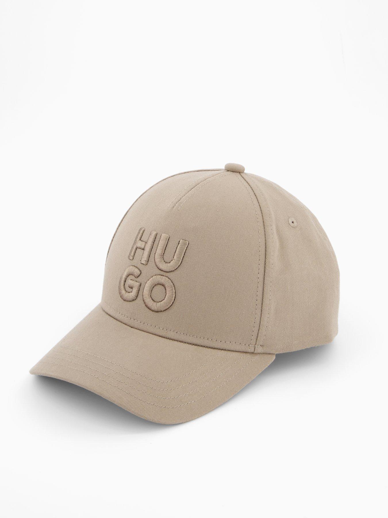  image of hugo-jude-stacked-logo-cap-brown