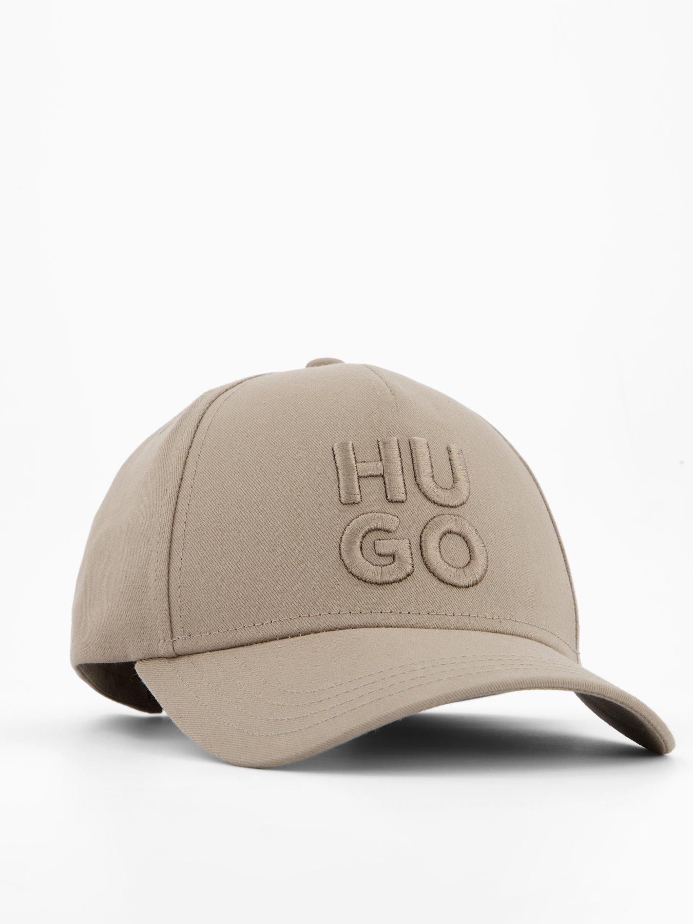  image of hugo-jude-stacked-logo-cap-brown