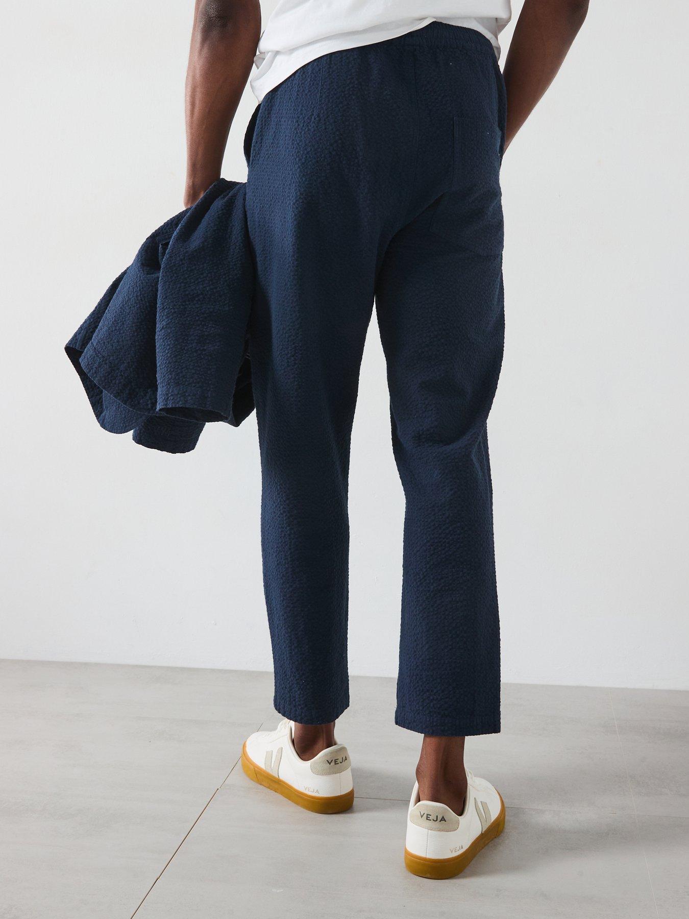  image of farah-hawtin-drawstring-tapered-fit-trousers-navy