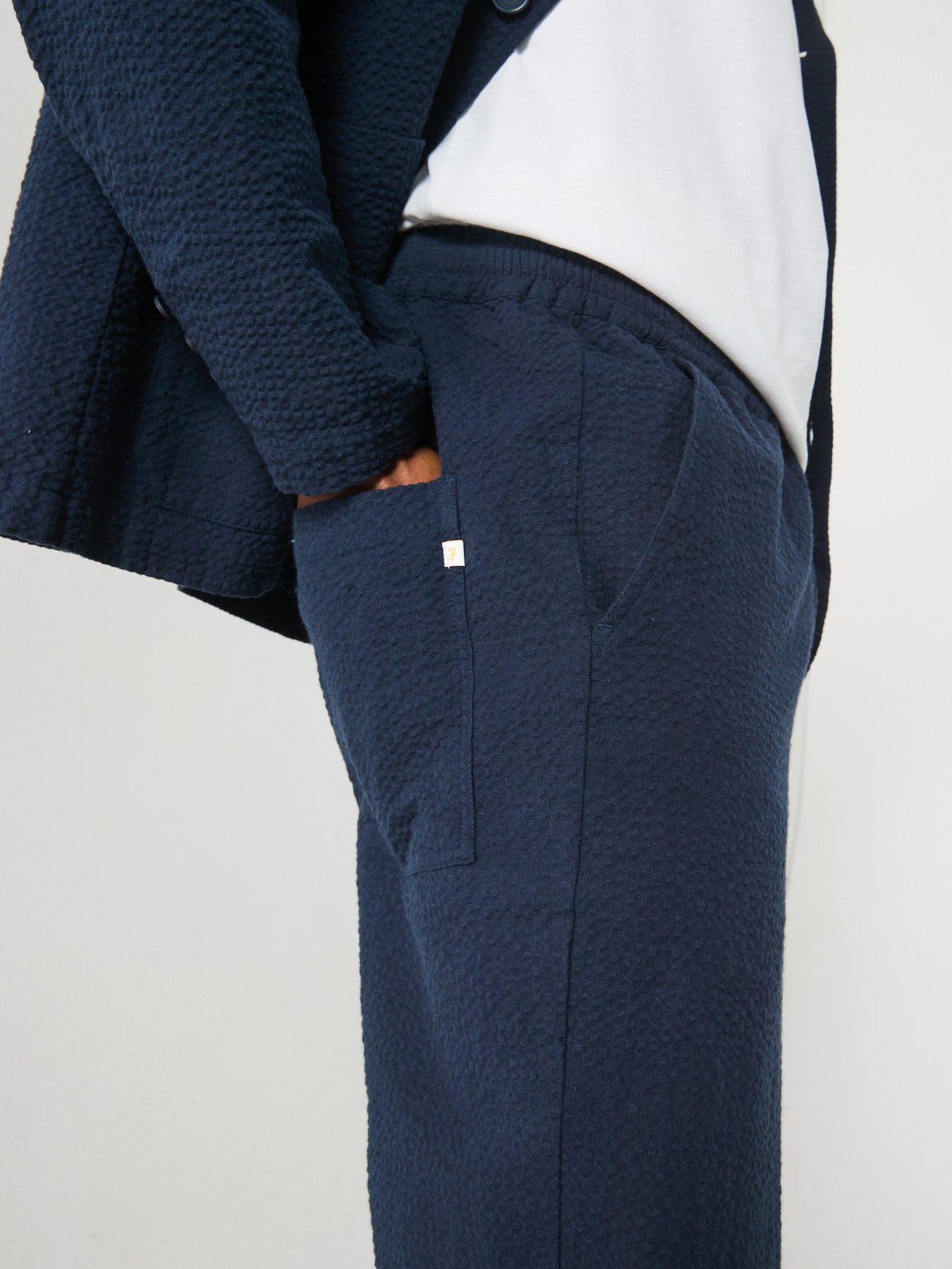  image of farah-hawtin-drawstring-tapered-fit-trousers-navy