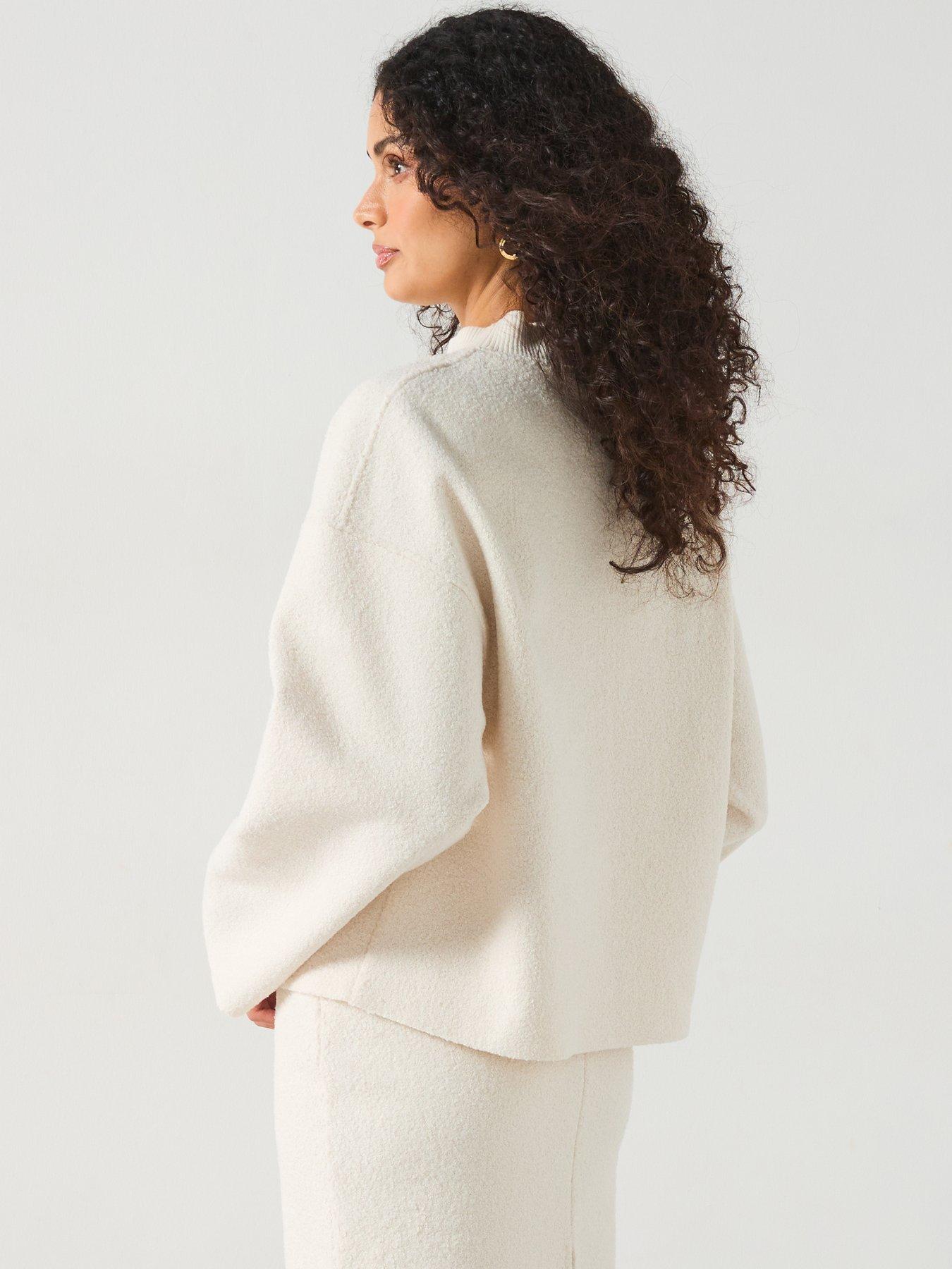  image of mango-perkins-neck-boucle-sweatshirt-cream