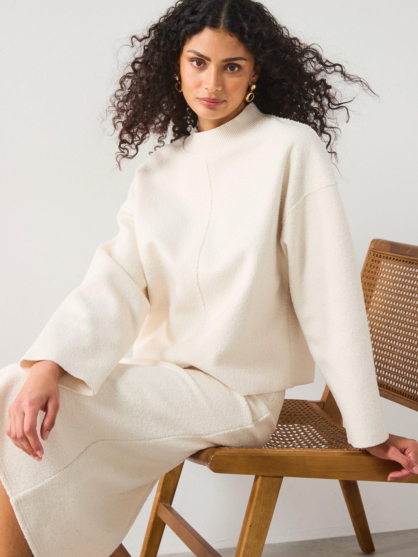  image of mango-perkins-neck-boucle-sweatshirt-cream