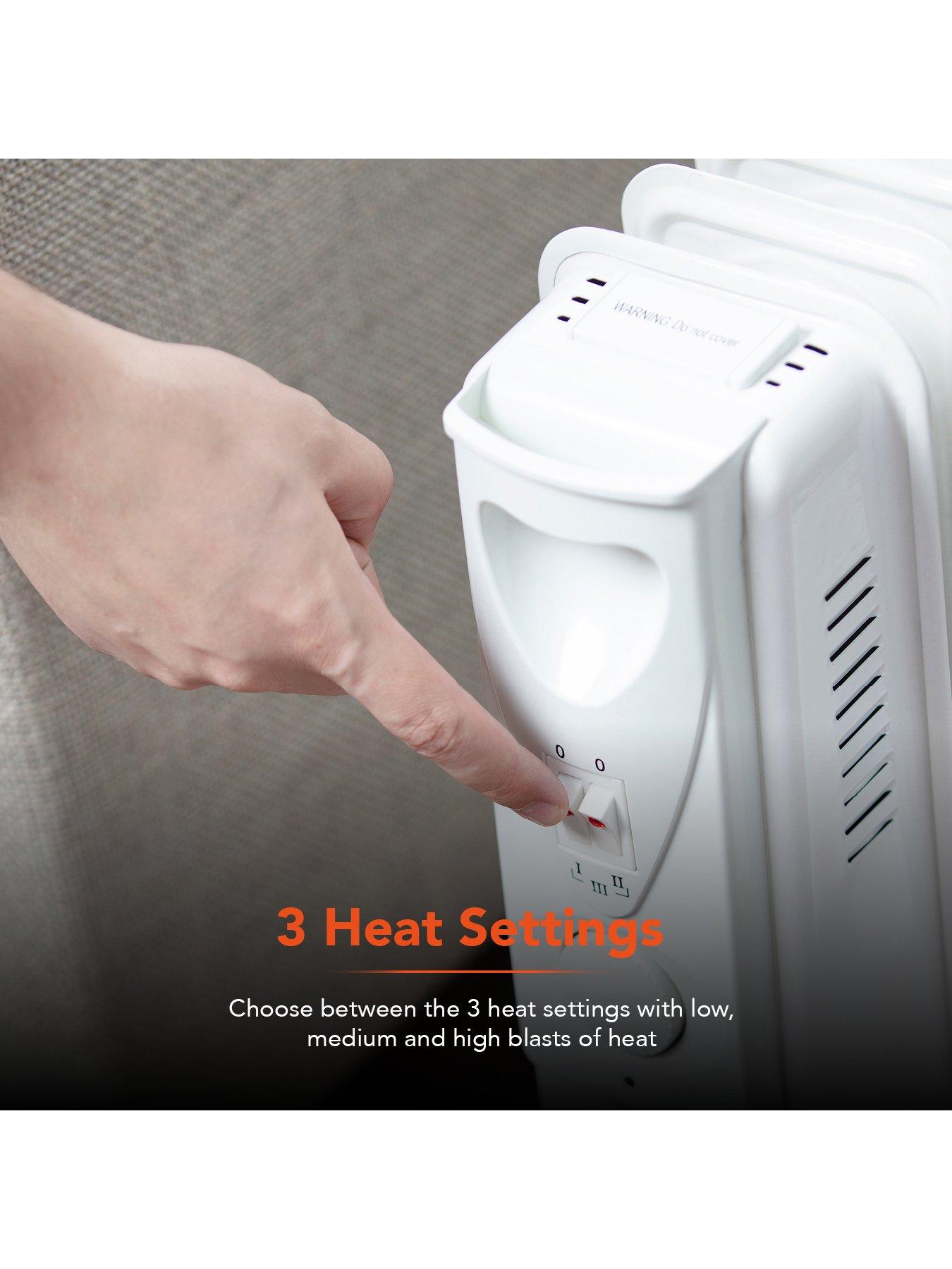  image of warmlite-2000w-9-fin-oil-filled-radiator-with-adjustable-timer-white