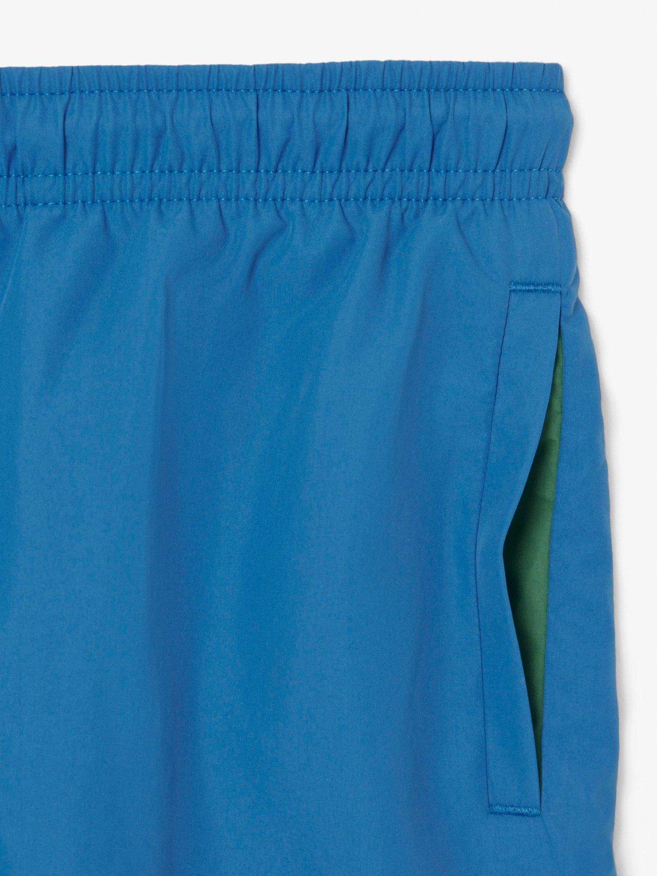 image of lacoste-kids-core-essentials-swim-short-blue
