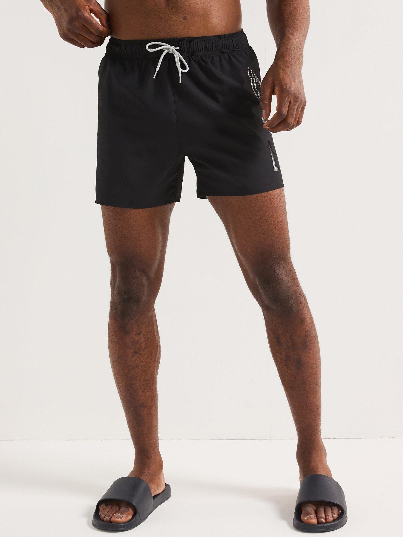 front image of ea7-emporio-armani-logo-swim-shorts-black
