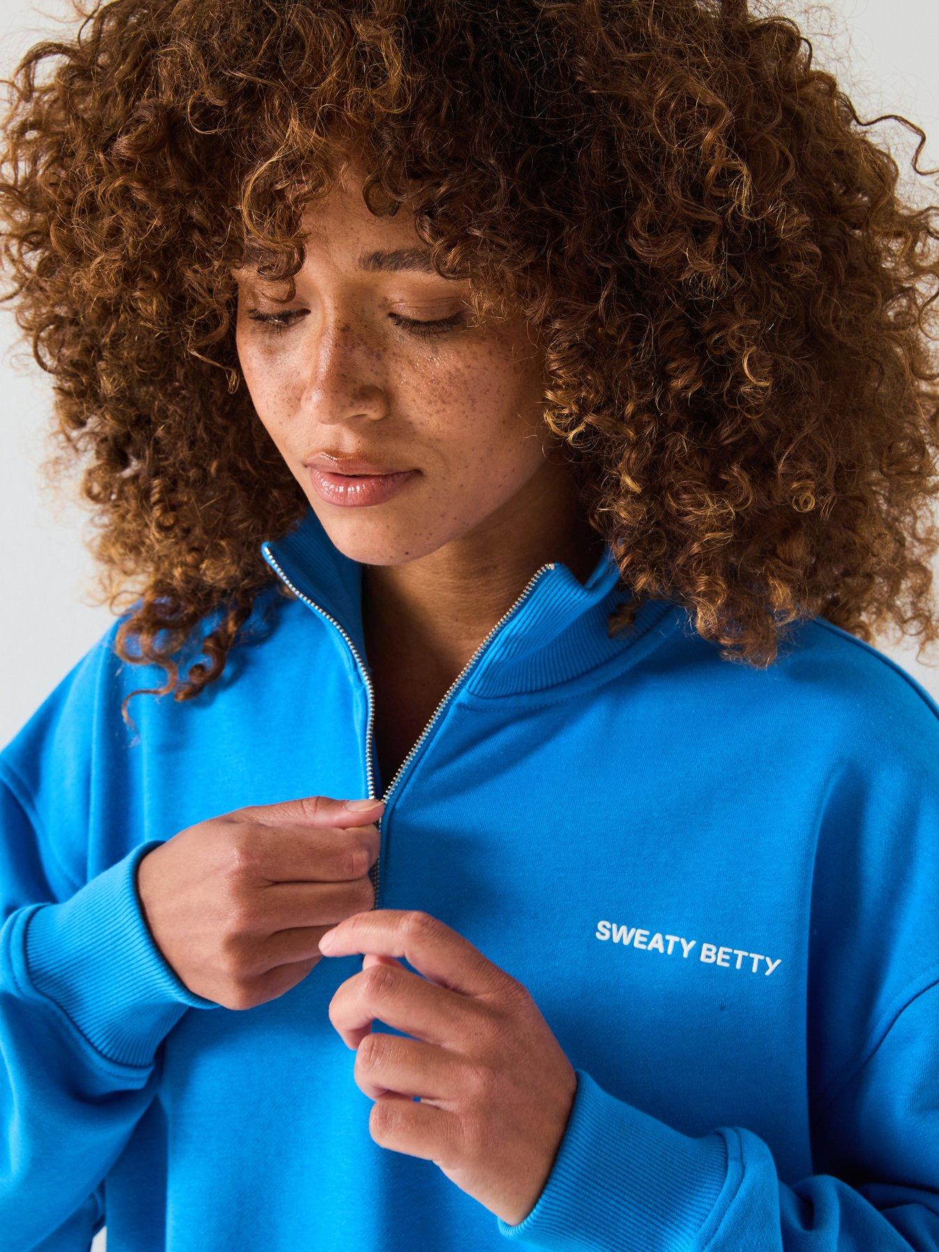  image of sweaty-betty-womens-training-revive-crop-half-zip-blue