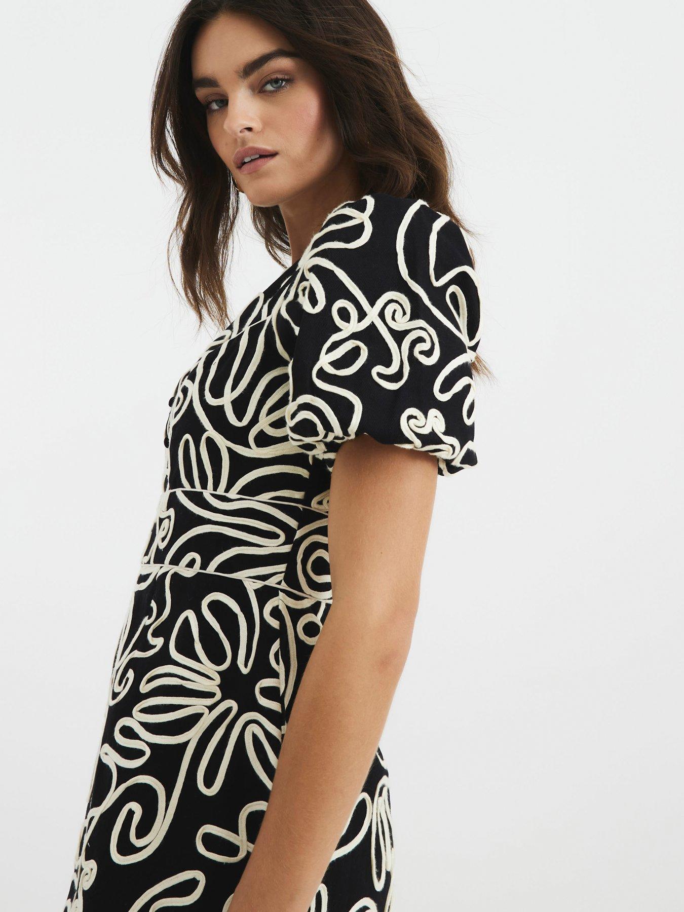 Image 2 of 4 of River Island Puff Sleeve Floral Mini Dress - Black