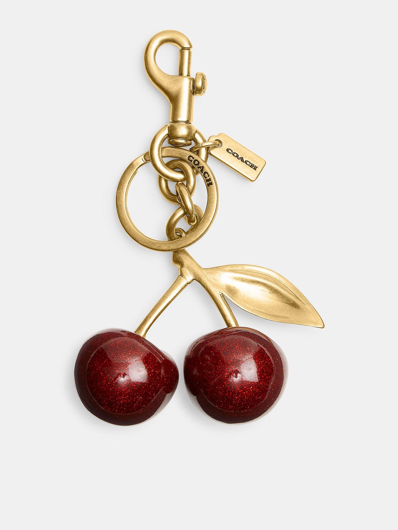 front image of coach-resin-cherry-bag-charm-red