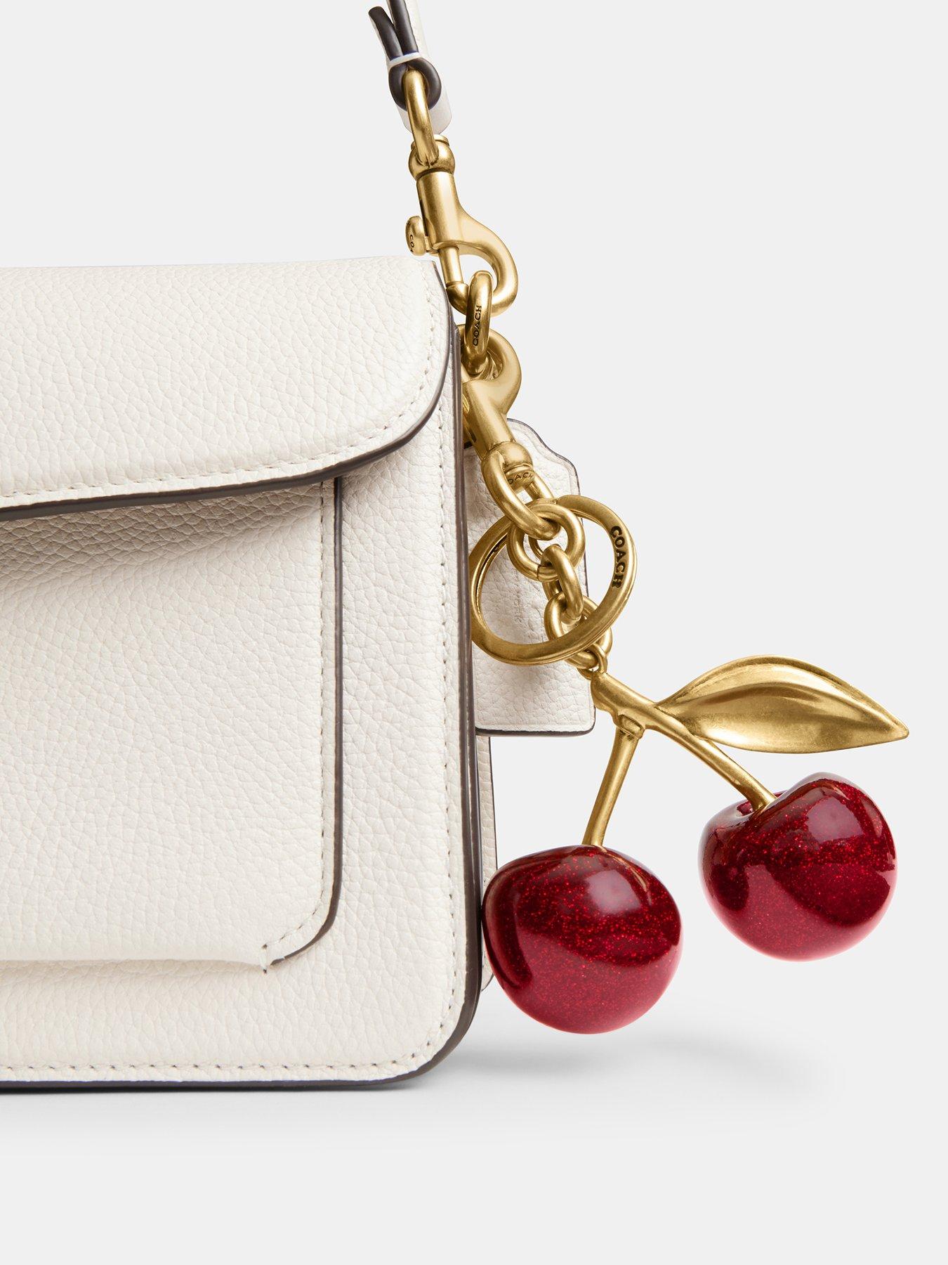 back image of coach-resin-cherry-bag-charm-red