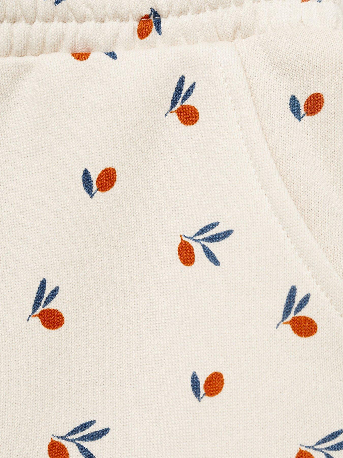  image of mango-baby-girls-printed-joggers-light-cream