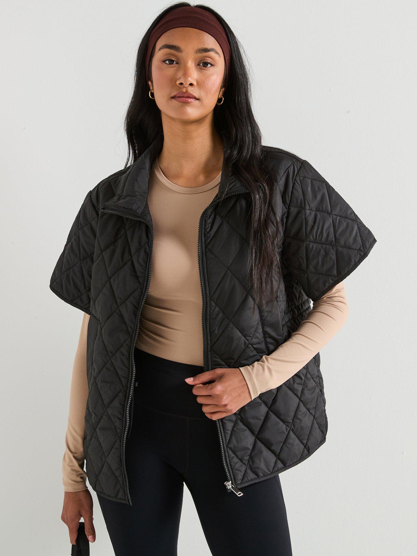 undefined GROWN ON SLEEVE QUILTED VEST - Black