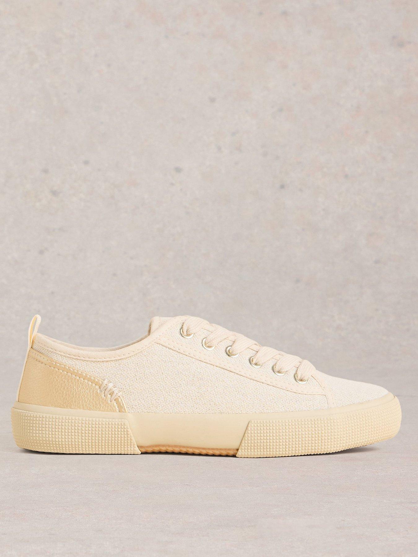  image of white-stuff-pippa-canvas-lace-up-trainer-beige