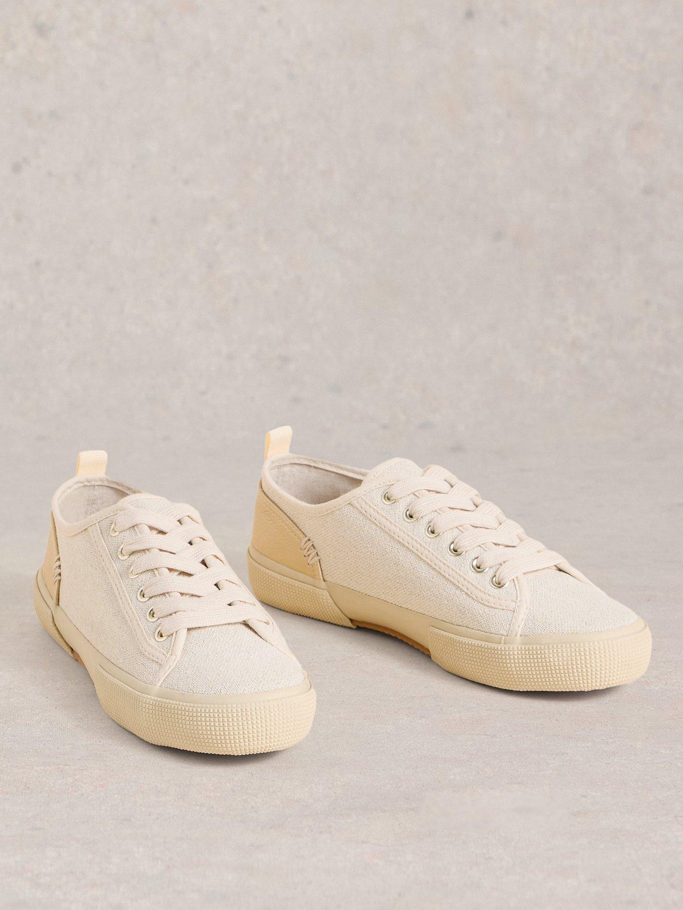  image of white-stuff-pippa-canvas-lace-up-trainer-beige