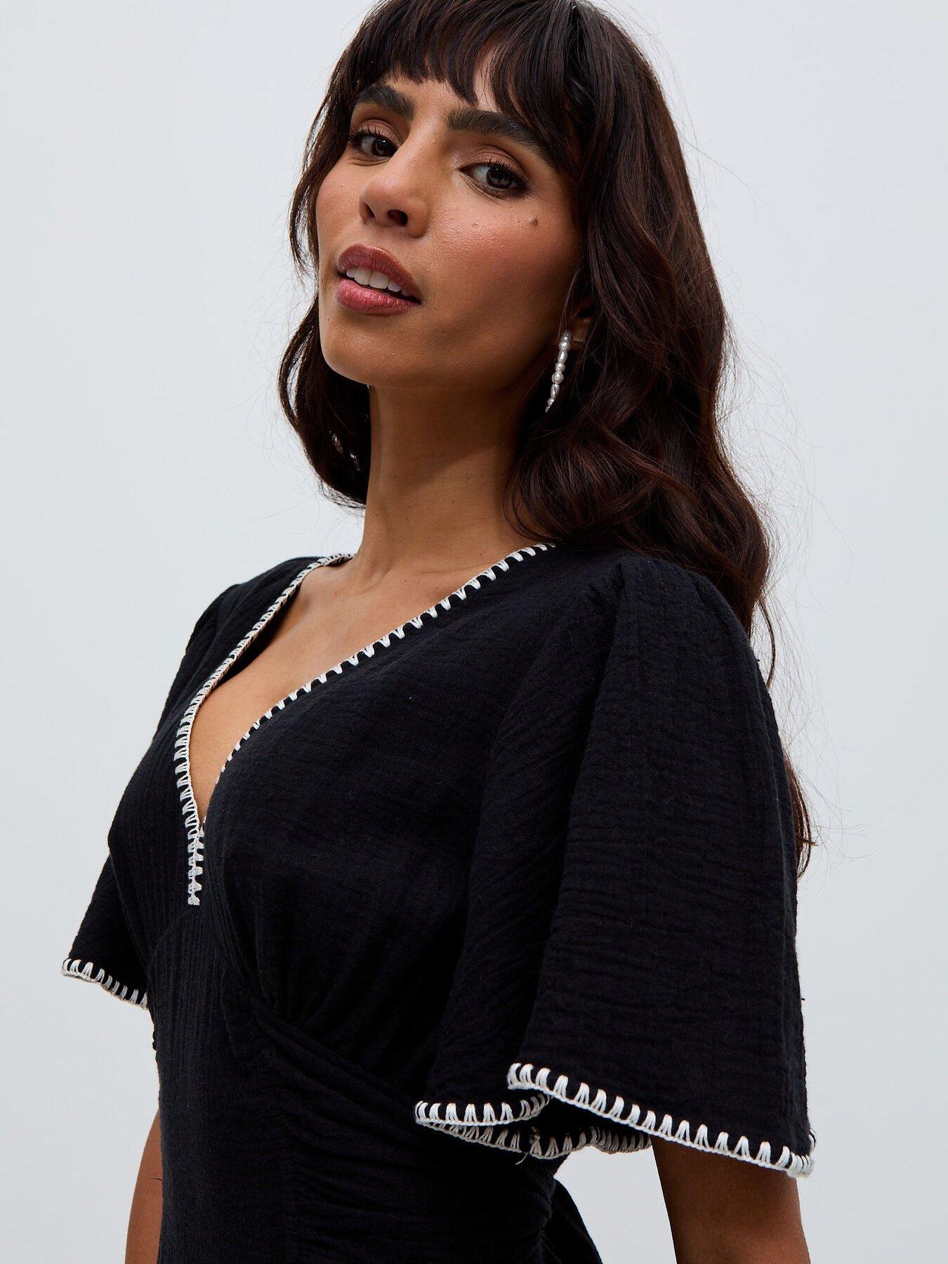  image of raffya-delilah-v-neck-front-tie-midi-dress-black