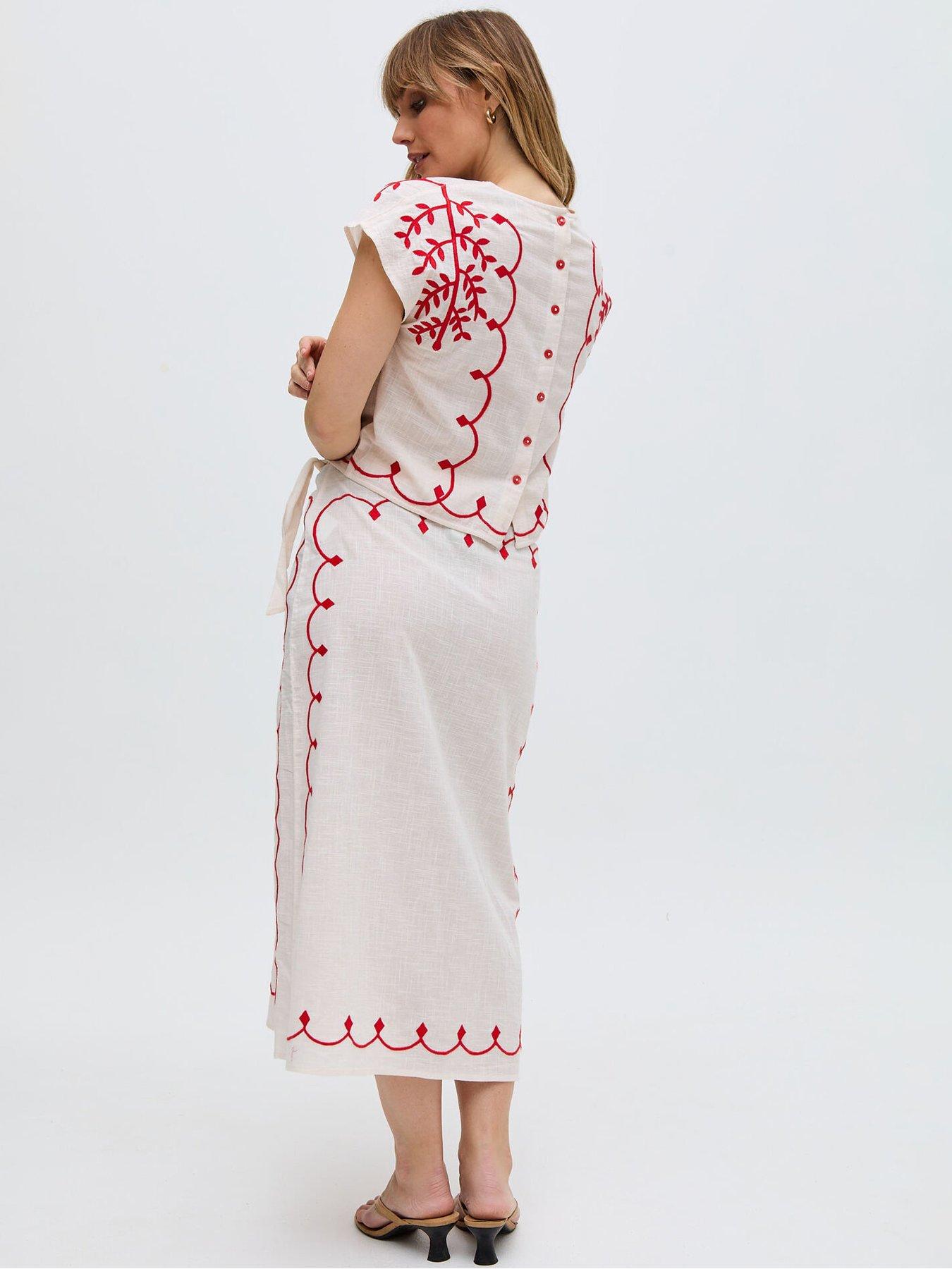  image of raffya-fraya-cross-hatch-embroidered-wrap-midi-skirt-white