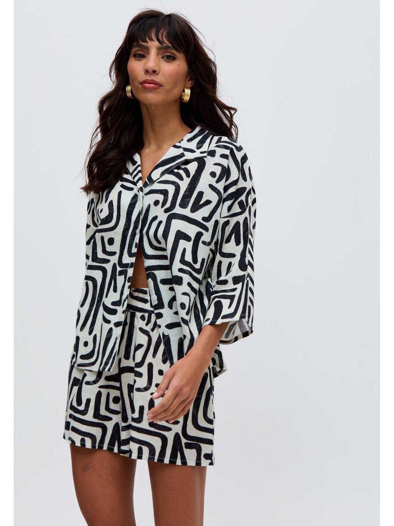  image of raffya-nicola-paperbag-waist-warhol-print-short-multi