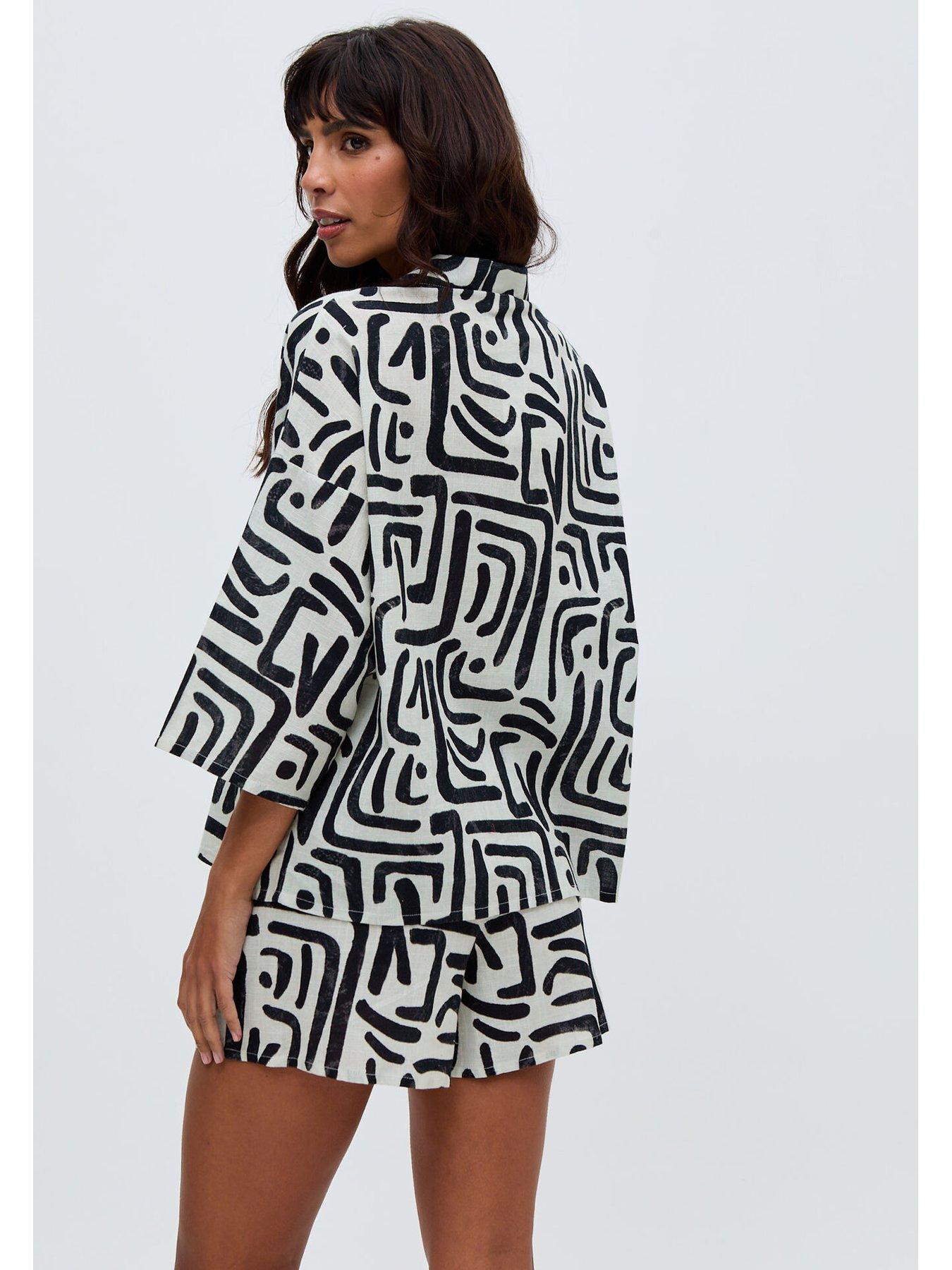 image of raffya-nicola-paperbag-waist-warhol-print-short-multi