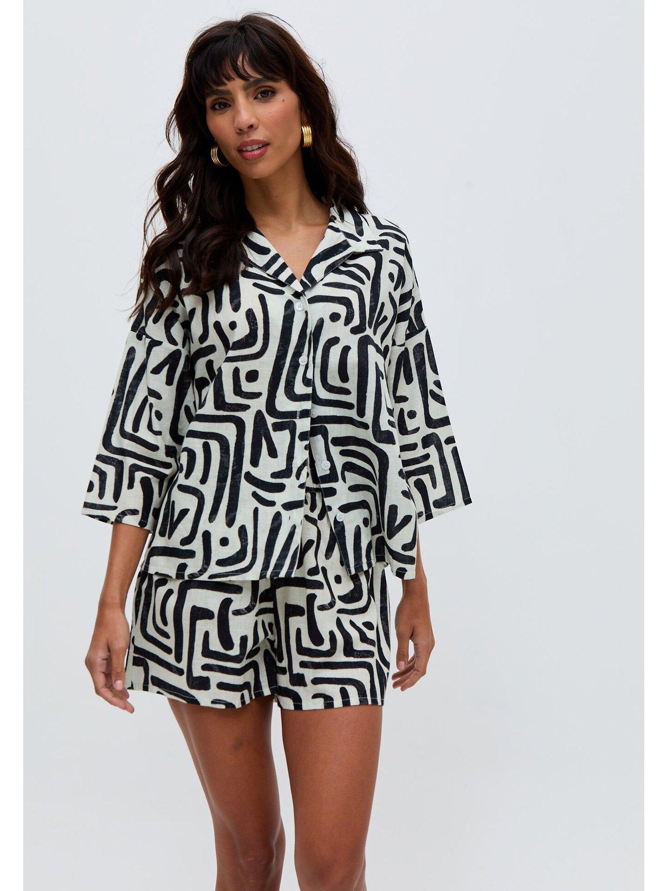  image of raffya-nicola-paperbag-waist-warhol-print-short-multi